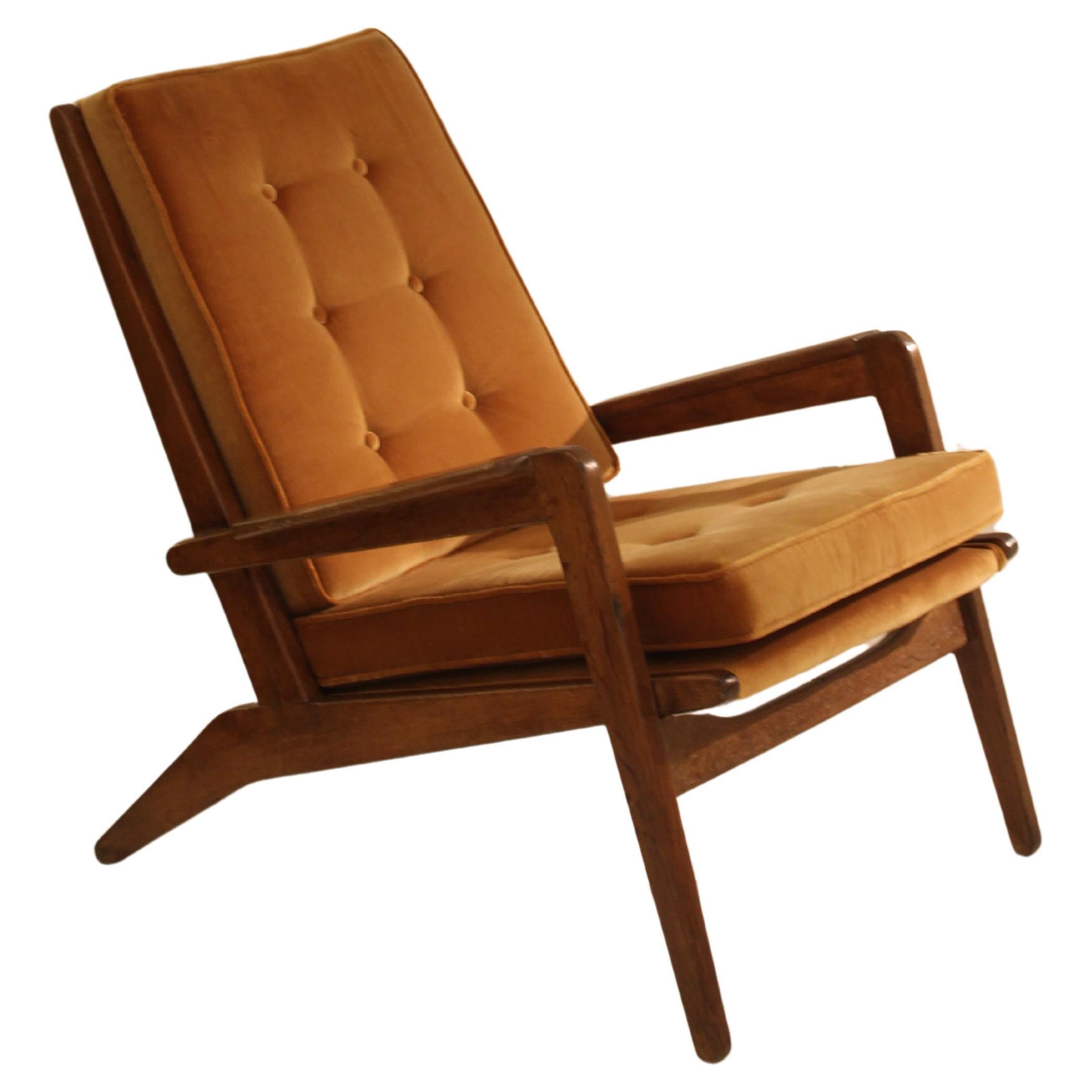 Wood and velvet armchair by Pierre Gauriche For Sale