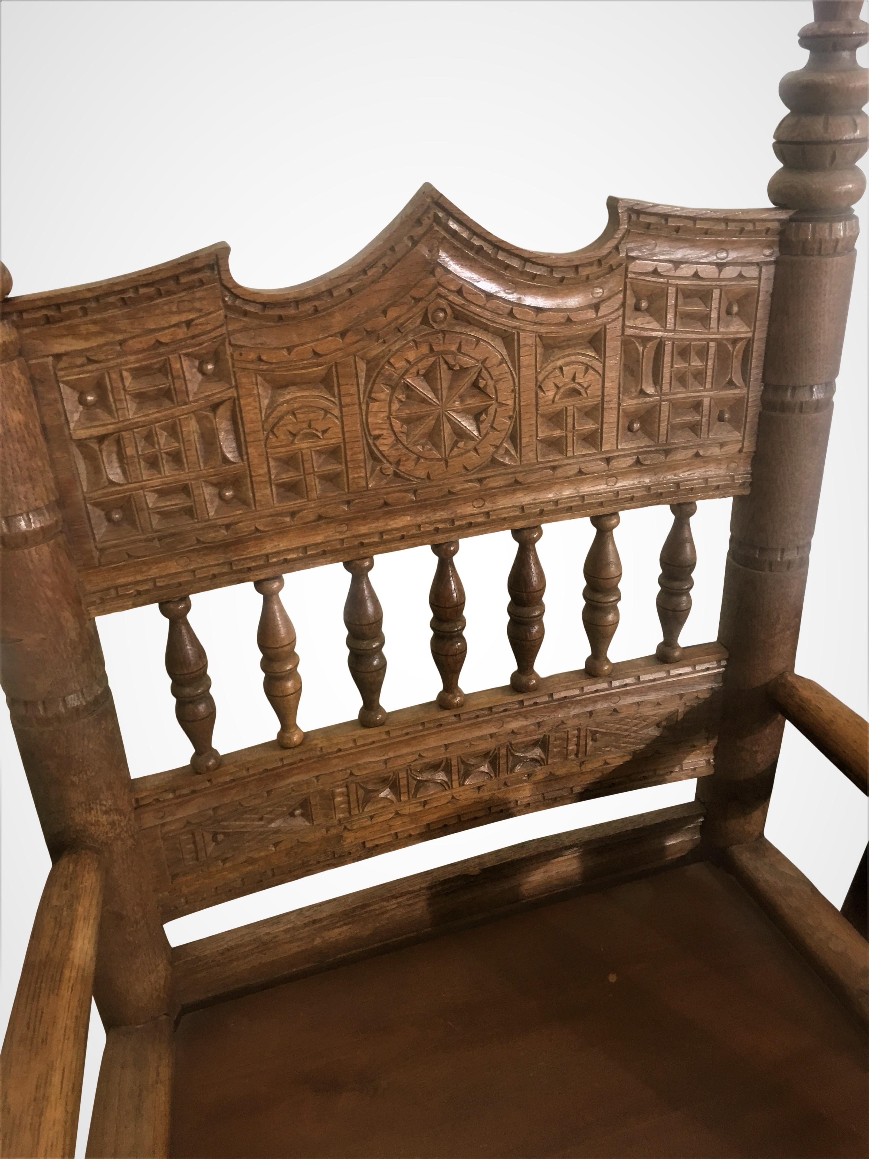 Pair of hand-carved accent armchairs. Measure: Arm 26