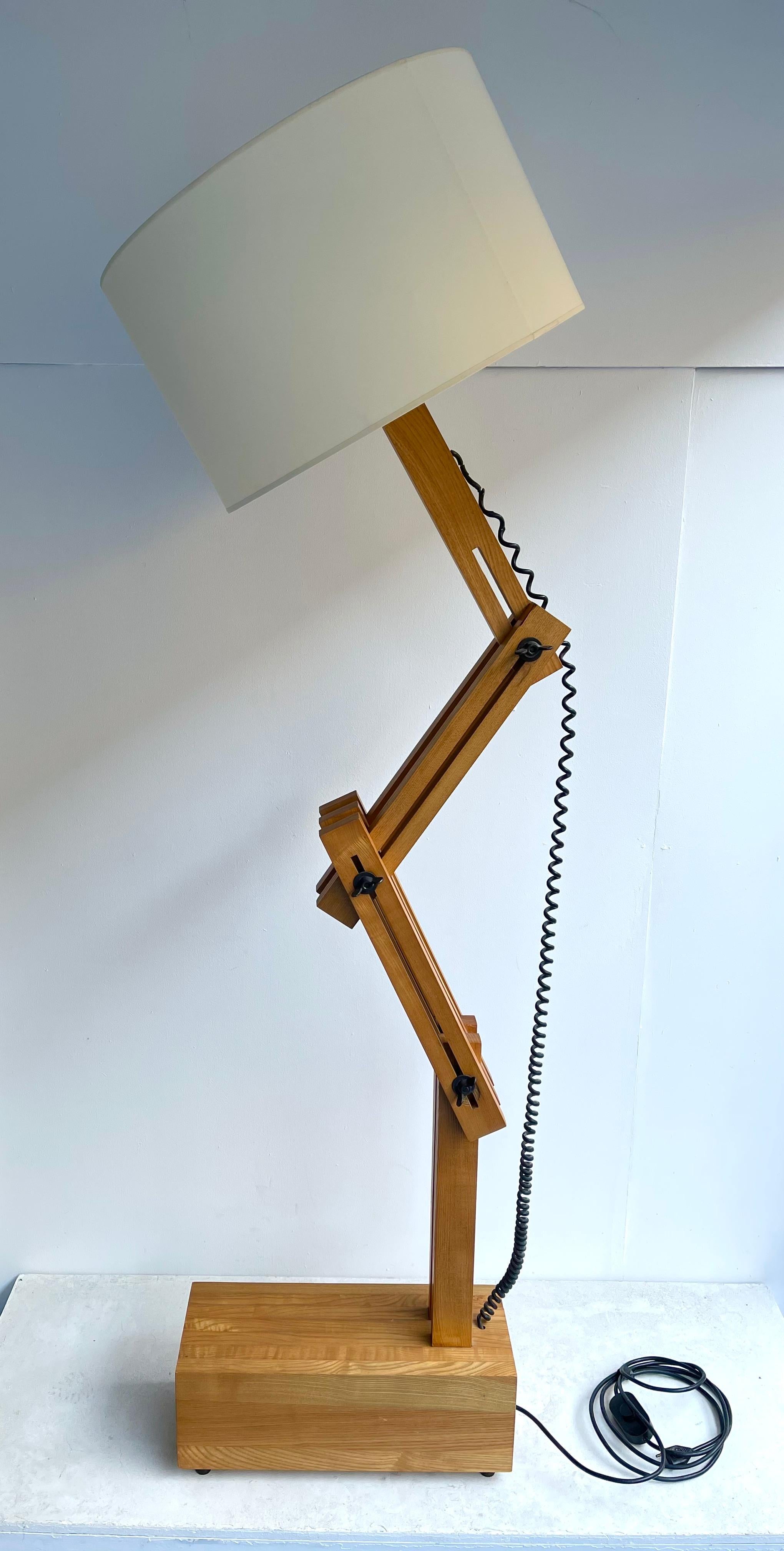 Large architect floor lamp modular articulated wood by the french designer Daniel Pigeon.

Demo shade not included
Measurements indicated as on the photos with demo shade
Measurements lamp only as on the photos H165 x W20 x D50 cms.
 