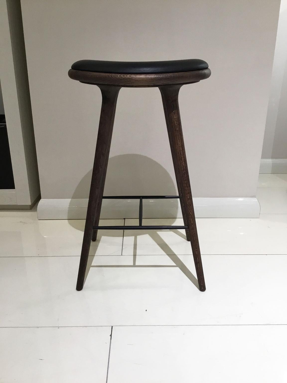 The Mater High stool is designed by the Danish architect duo Space Copenhagen and is regarded as a New Danish Classic. With its organic yet minimalist style, this bar stool is suitable for both residential and commercial use. The wood is FSC