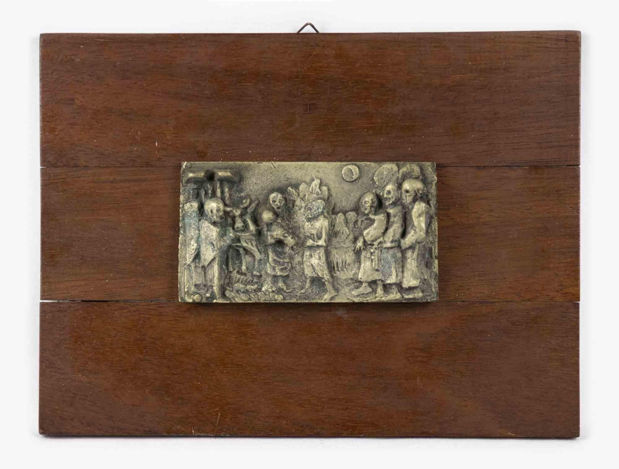 Wood base with brass relief is an original decorative object realized in the early 20th century.

Made in Italy.

The base has been realized entirely in wood and, on the top, a brass high relief depicting a procession has been applied.