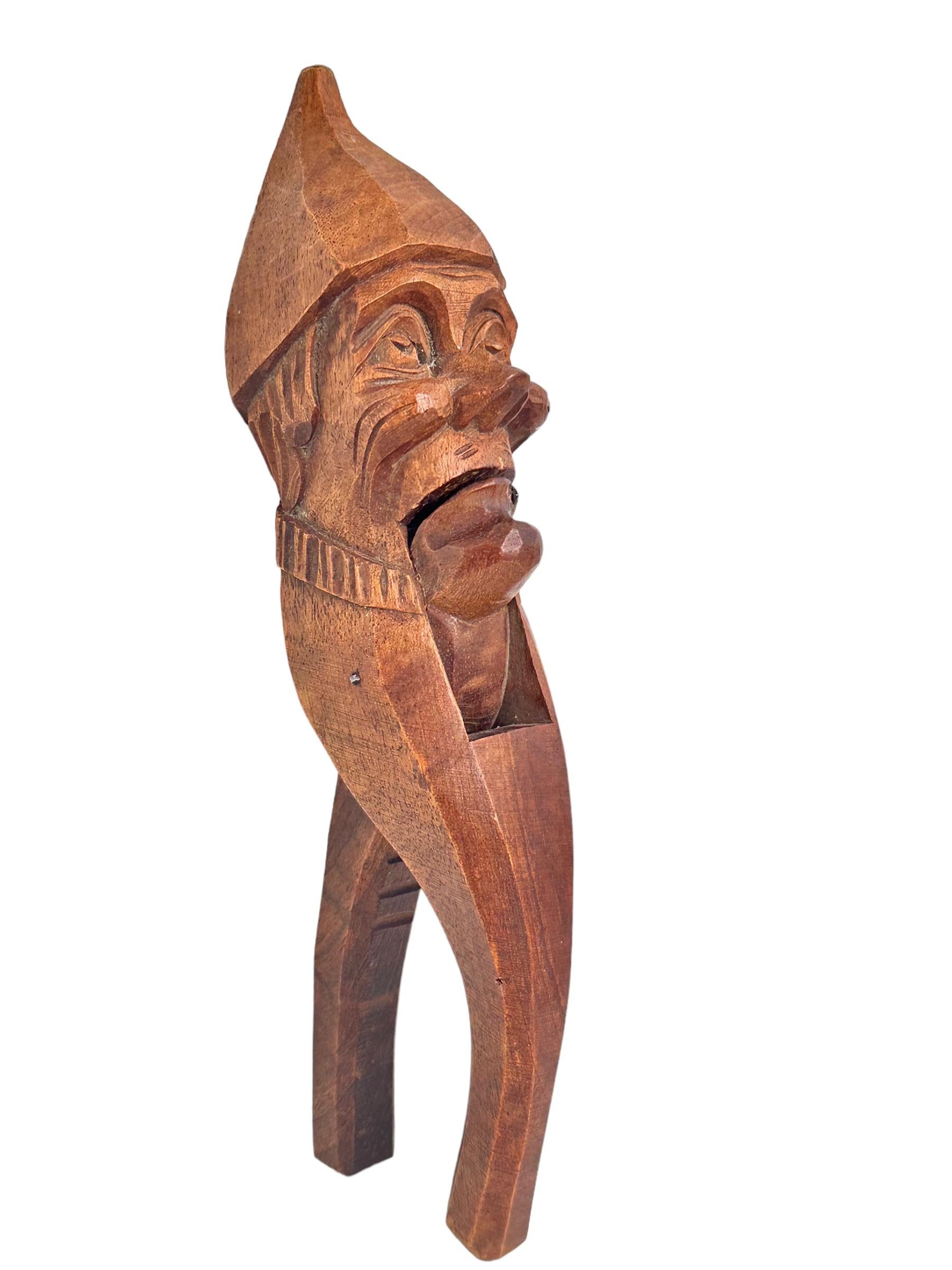 Classic early 1930s Black Forest Brienz wood carved Nutcracker in form of a Gnome. Nice addition to your room or just for use it on your desk. Found at an Estate sale in Nuremberg, Germany.