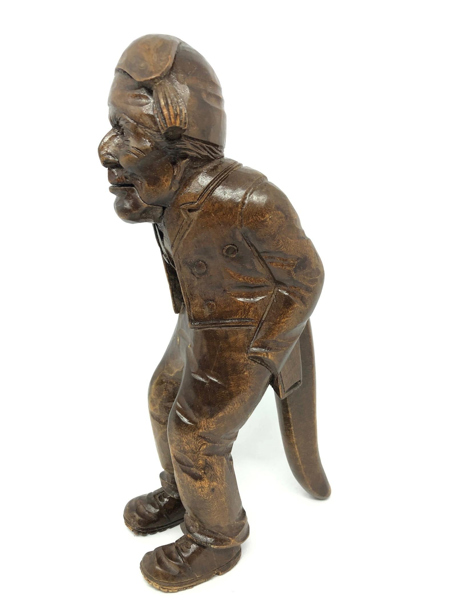 Classic early 1900s Black Forest Brienz wood carved Nutcracker in form of an old man. Nice addition to your room or just for use it on your desk.