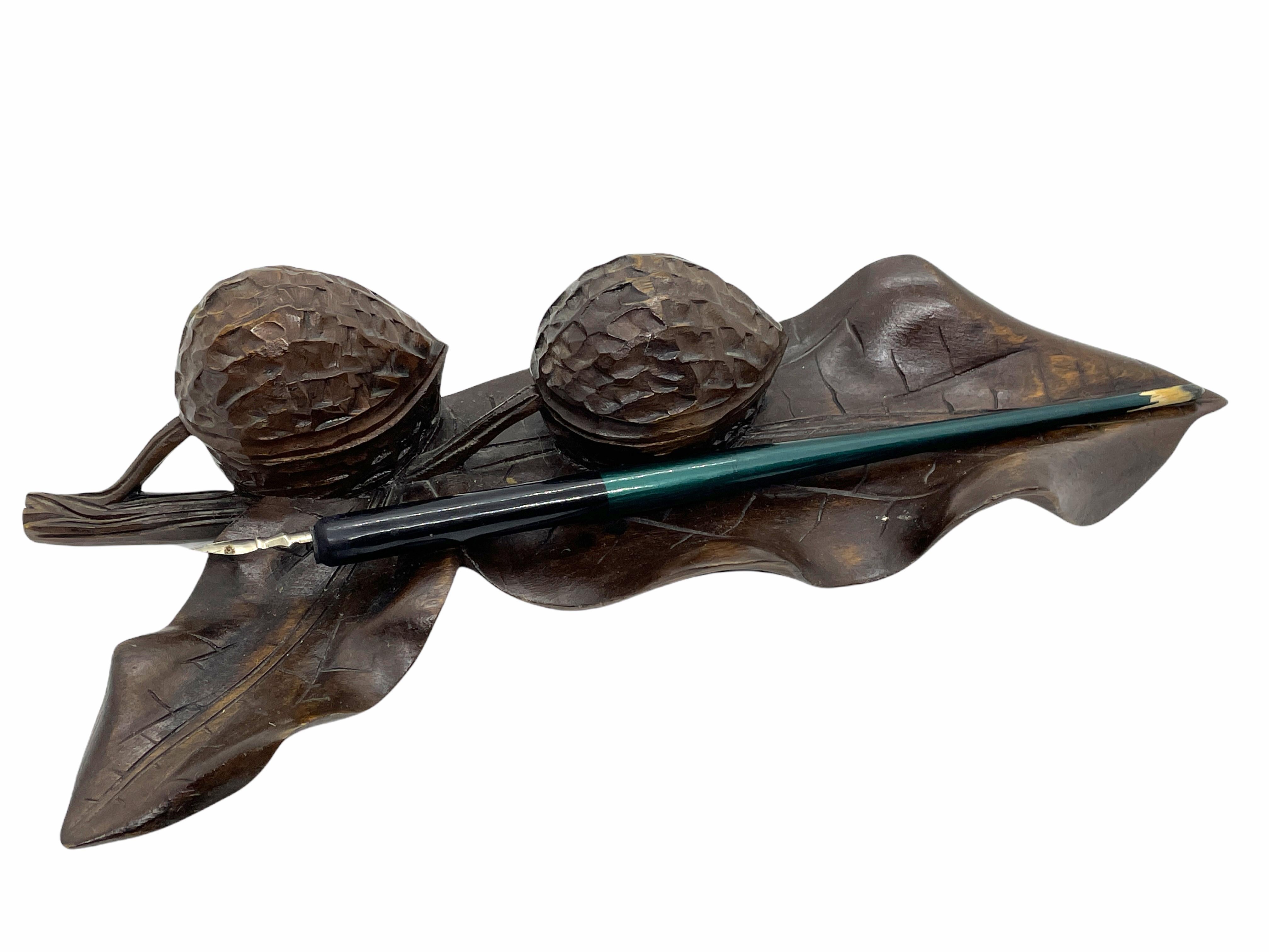 Classic early 1890s Black Forest Brienz wood carved inkwell, paperclip holder or Catchall in form of walnuts on a leaf. Nice addition to your room or just for use it on your desk. Made of hand carved wood. Found at an estate sale in Nuremberg,