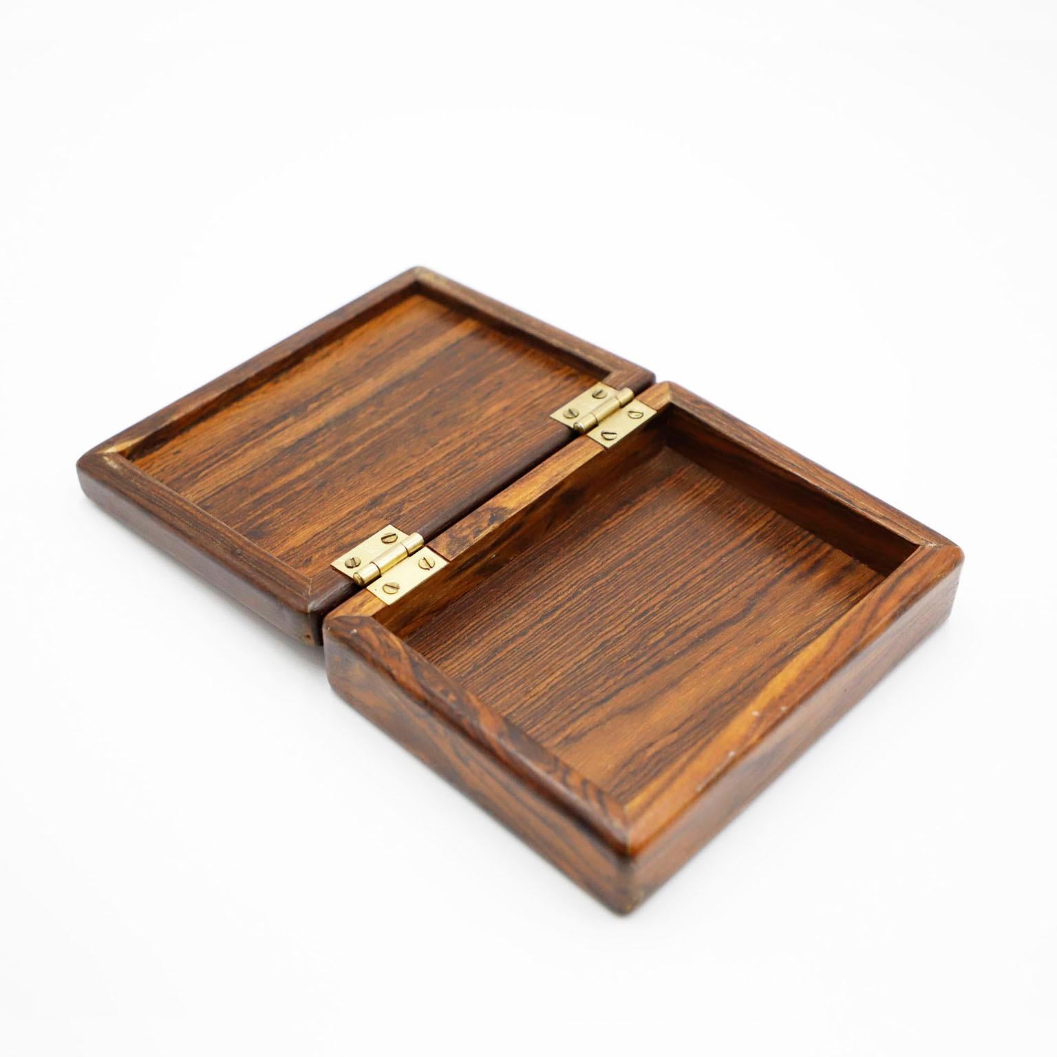 Designed by Don Shoemaker and handcrafted by SEÑAL, S.A. Mexico, circa 1960s. Using exotic local wood in Mexico such as Granadillo, excellent vintage condition. 
The box has beautiful patina but if the customer wishes we can varnish it again at no