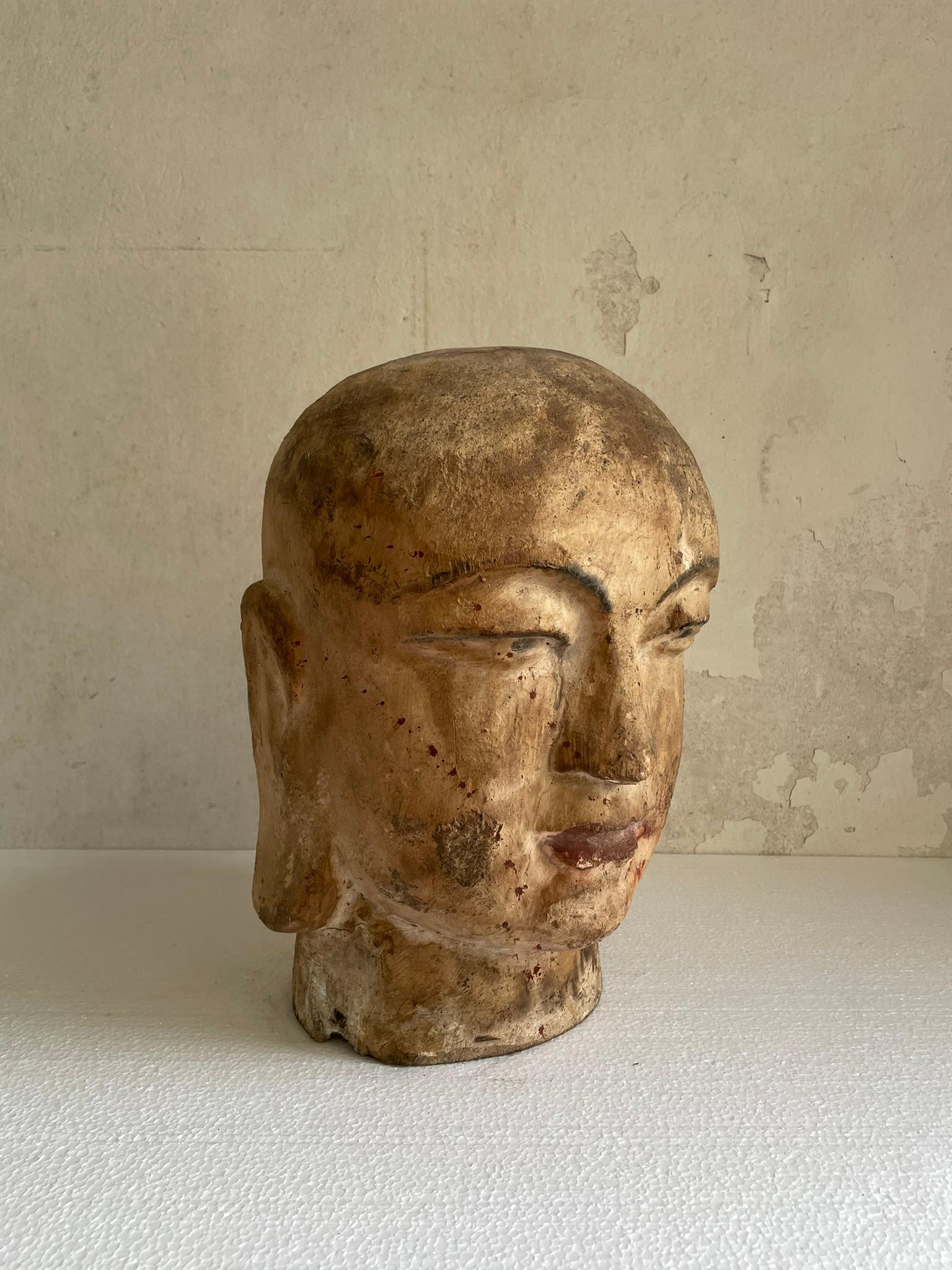 Ancient chinese figure of peaceful Buddha head carved in wood. 
Beautiful signs of age to keep.


