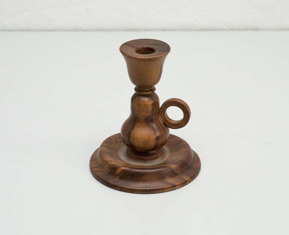 Wood candle holder, circa 1960
By Unknown manufacturer. Spain.
In original condition, with minor wear consistent with age and use, preserving a beautiful patina.

Materials:
Wood

Dimensions:
D 11.5 cm
W 12 cm
H 15 cm.
  