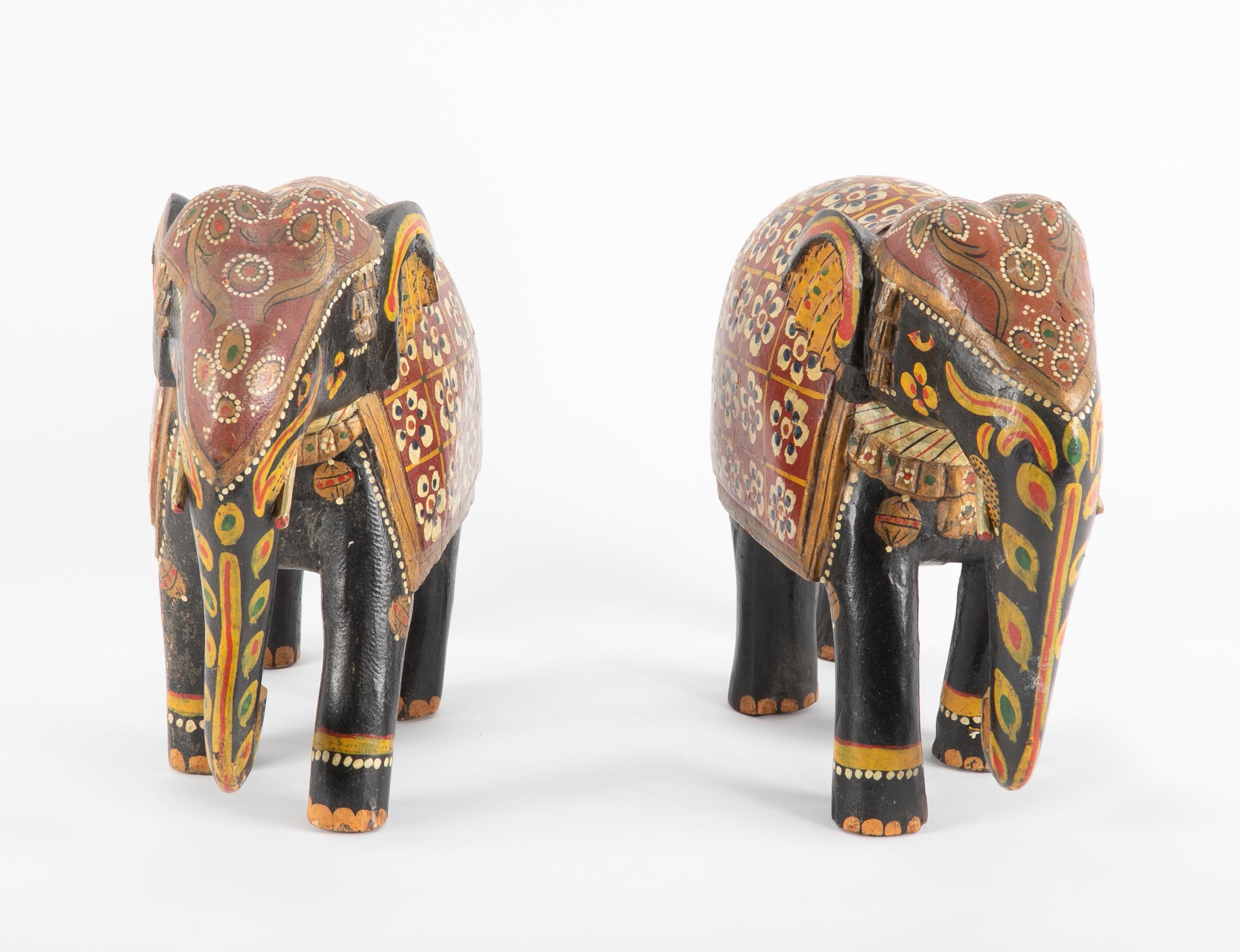 A 19th century wood carved pair of Asian elephants purchased in the 1930s. circa mid-1800s. 

