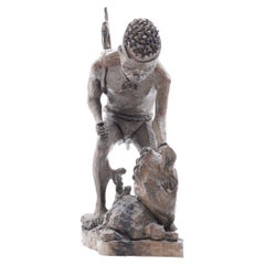 Wood carved Man Holding Warthog, hand carved made in South Africa