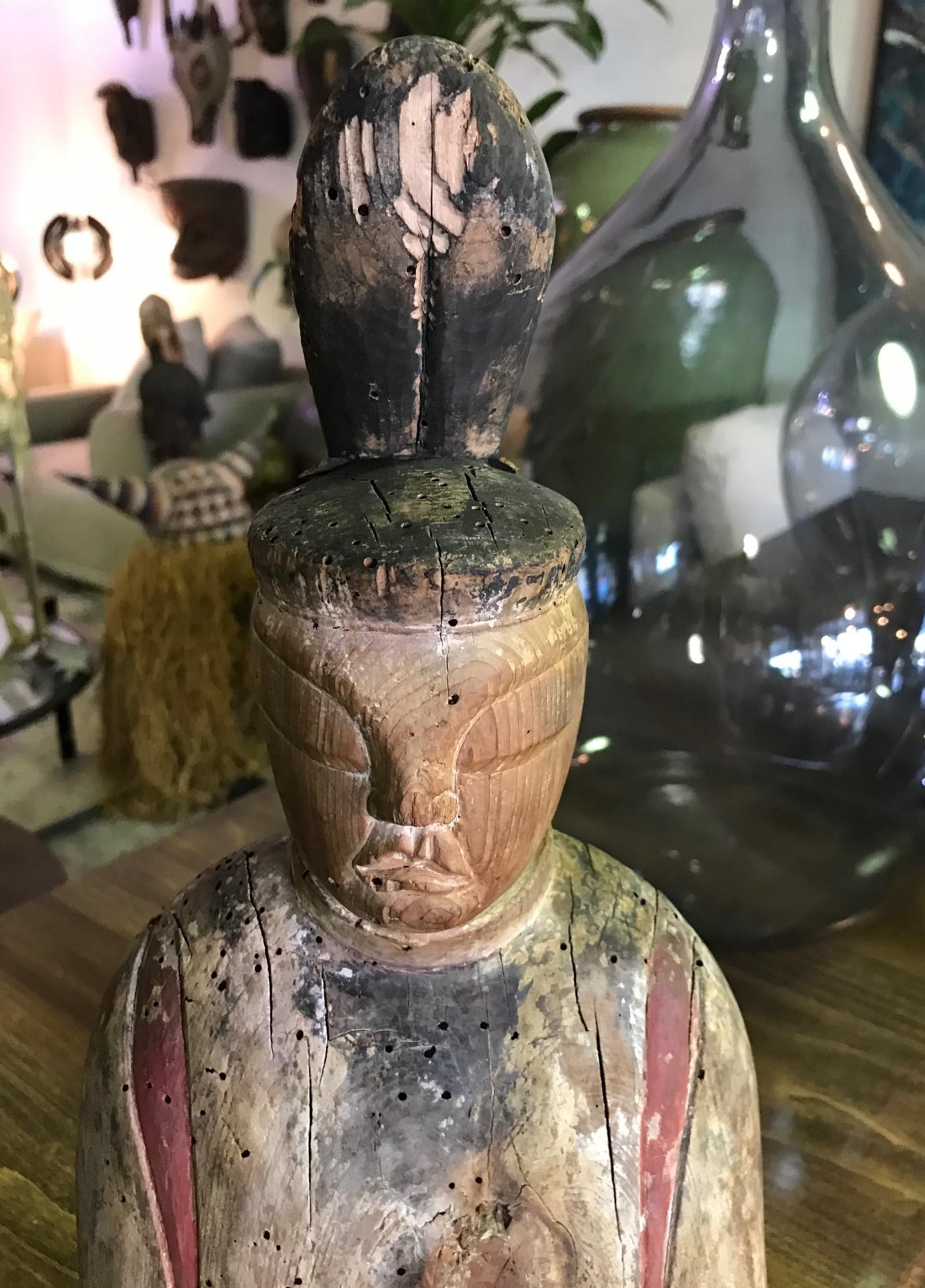 A wonderful piece, depicting a Japanese Shinto (Shintoism) priest in reflection. The wood carving shows clears signs of use and natural wear acquired over years of display. 

This piece comes from a large collection of Japanese art and artifacts.