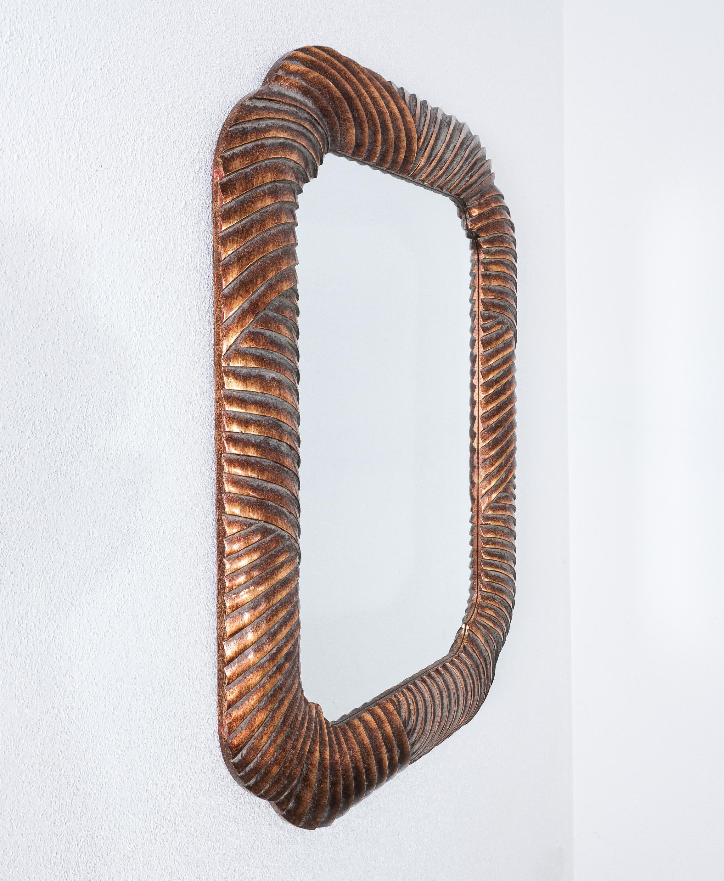 Italian Wood carved Trompe L’oeil Wall Mirror Bronze, Italy, circa 1970 For Sale