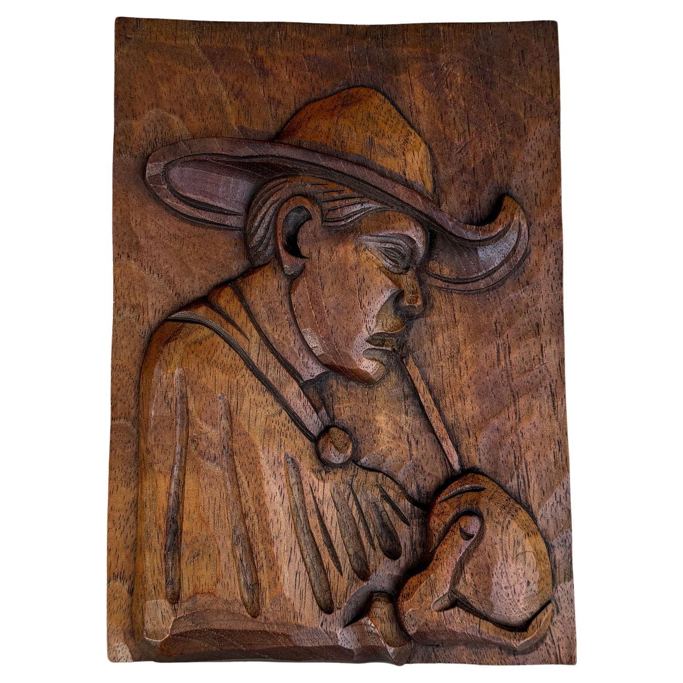 Wood Carved Wall Plaque of a Gaucho Man Drinking , Brazil, 20th Century