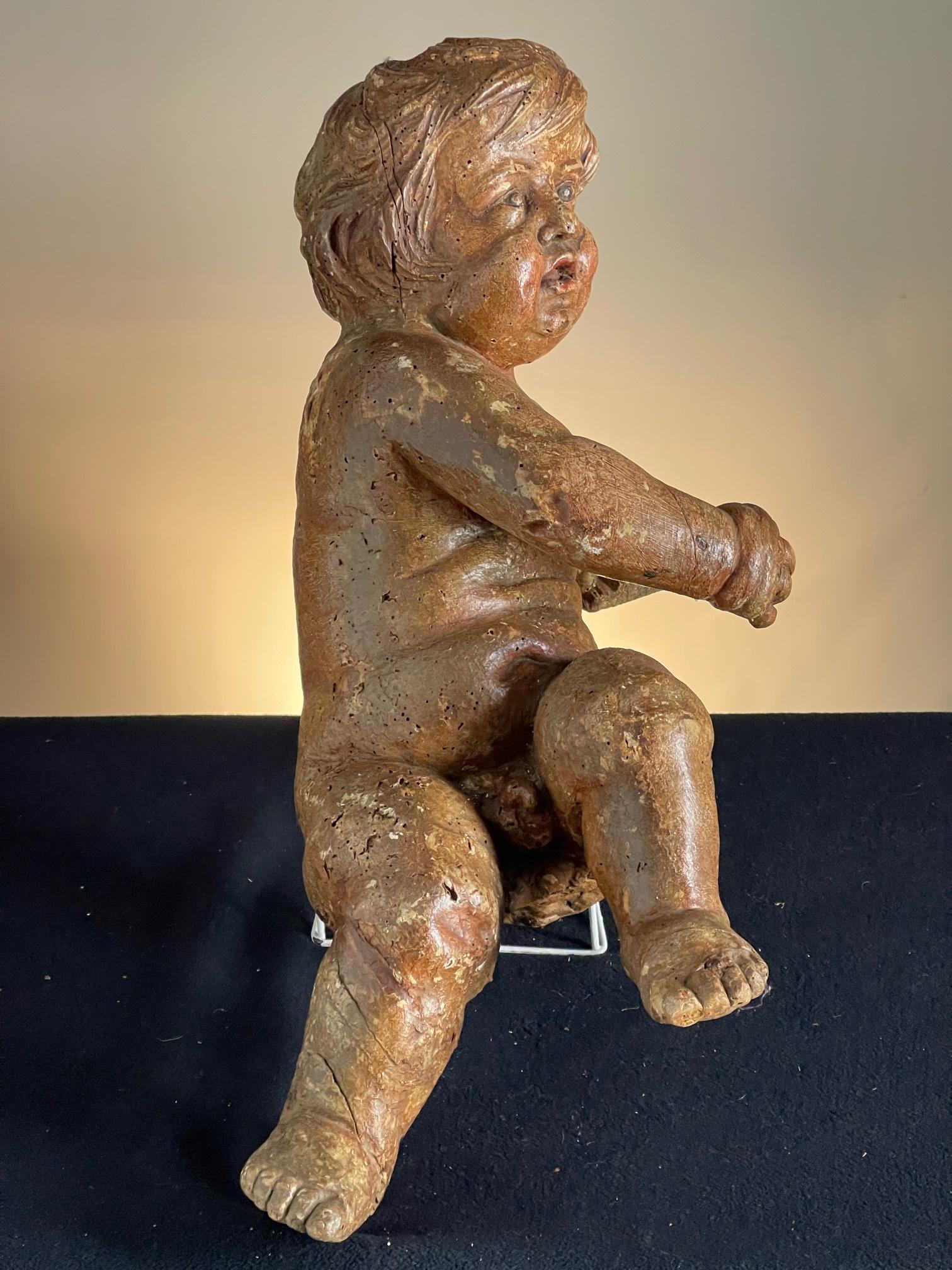 18th Century and Earlier Wood carving of a putti Circa 1650 For Sale