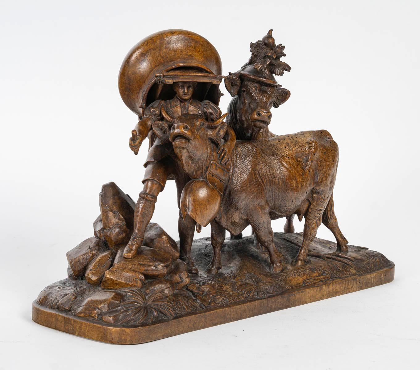 Wood carving of the black forest by Johan Huggier.

Carved wood sculpture of the black forest by Johan Huggier (1834-1912).  
h: 25cm, w: 33cm, d: 13cm