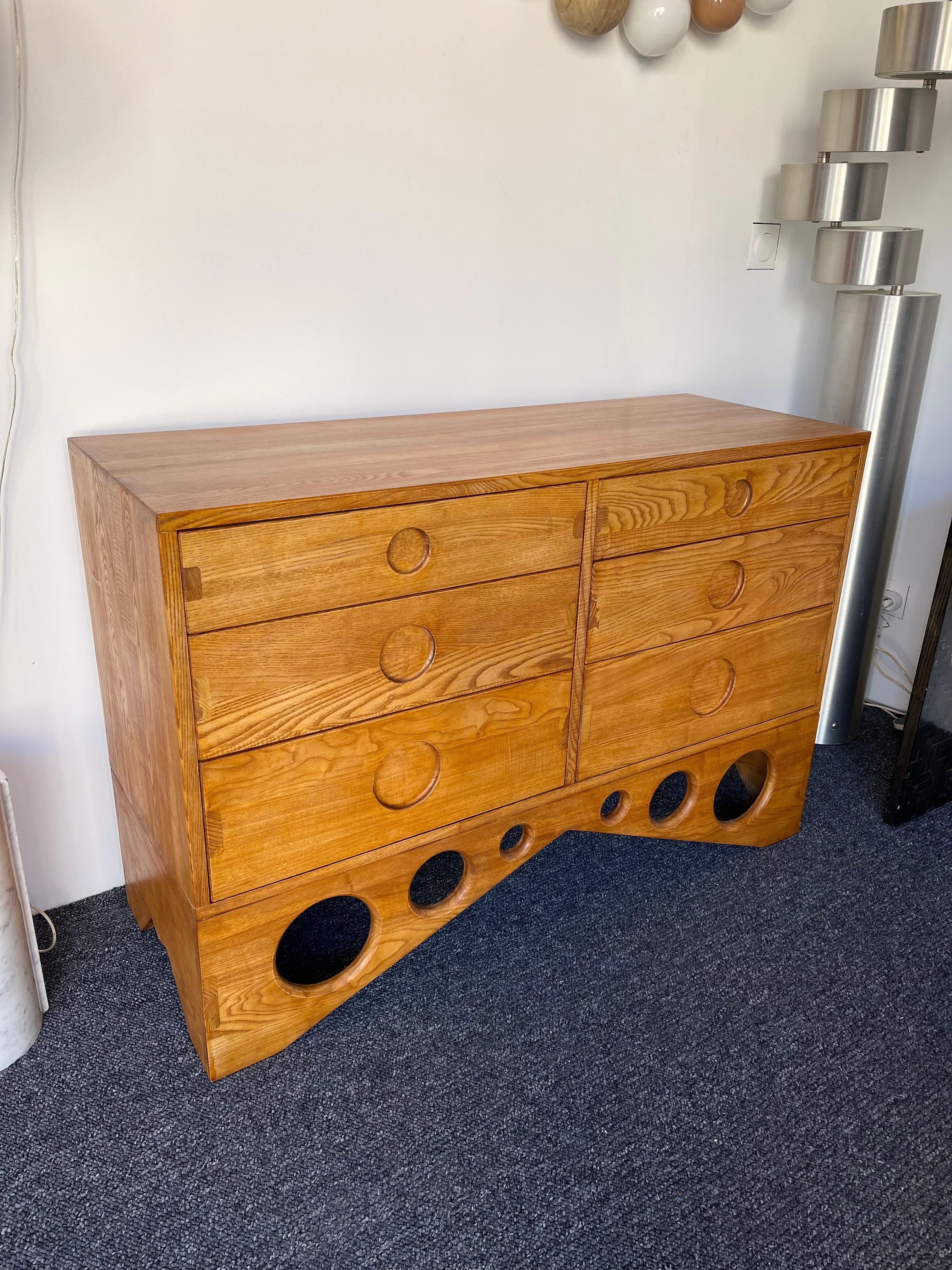 Massive wood chest of drawers or commode circle decor, italian design nice wood assembly construction. In the mood of Mid-Century Modern, scandinavian, contemporary design.