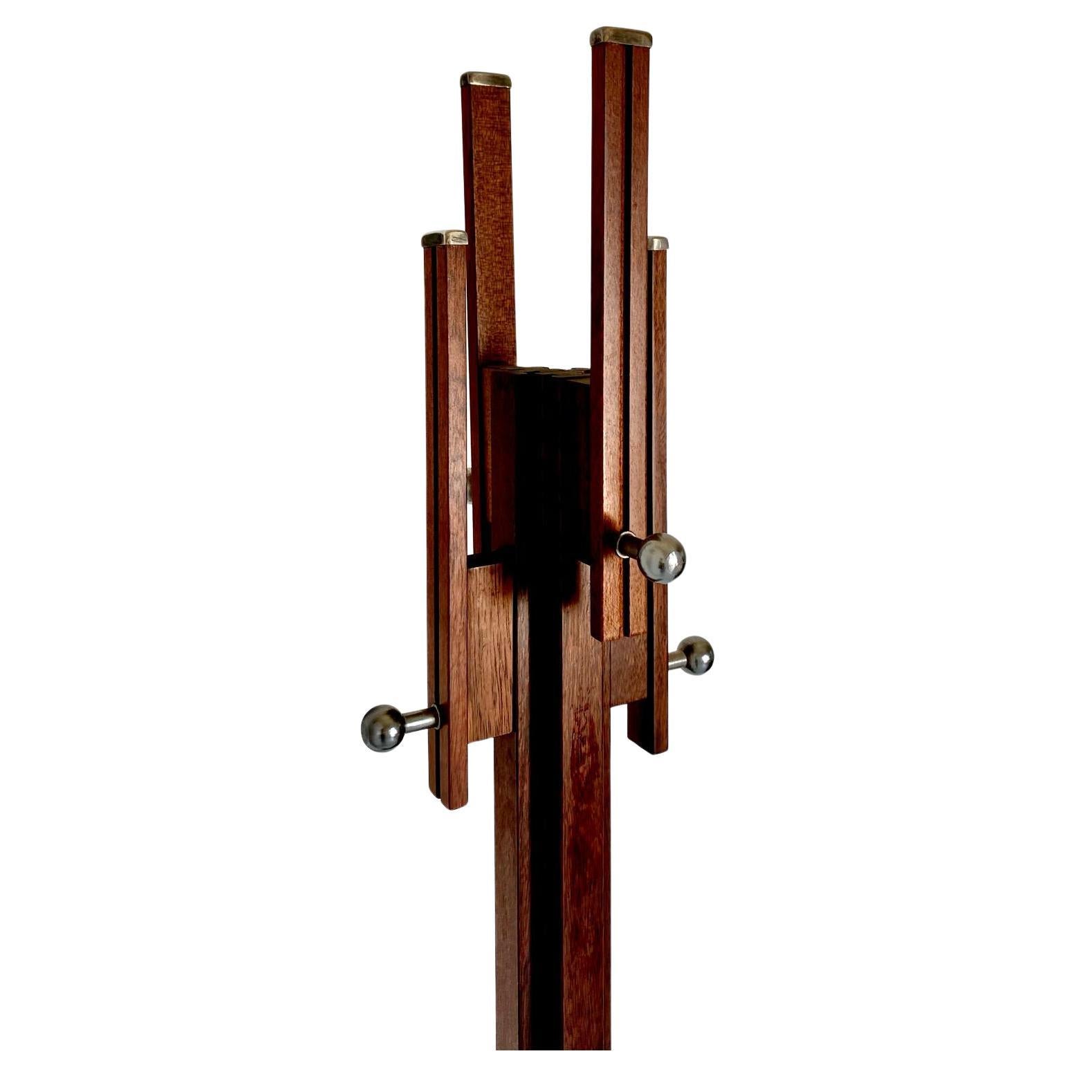 Carlo de Carli wood coat rack for FIARM, Italy, 1960's. 

Coat rack stand from the 1960s designed by Carlo de Carli for FIAM. Wood stem structure with chromed fittings. In very good conditions with only few signs of time. 

Please visit our profile