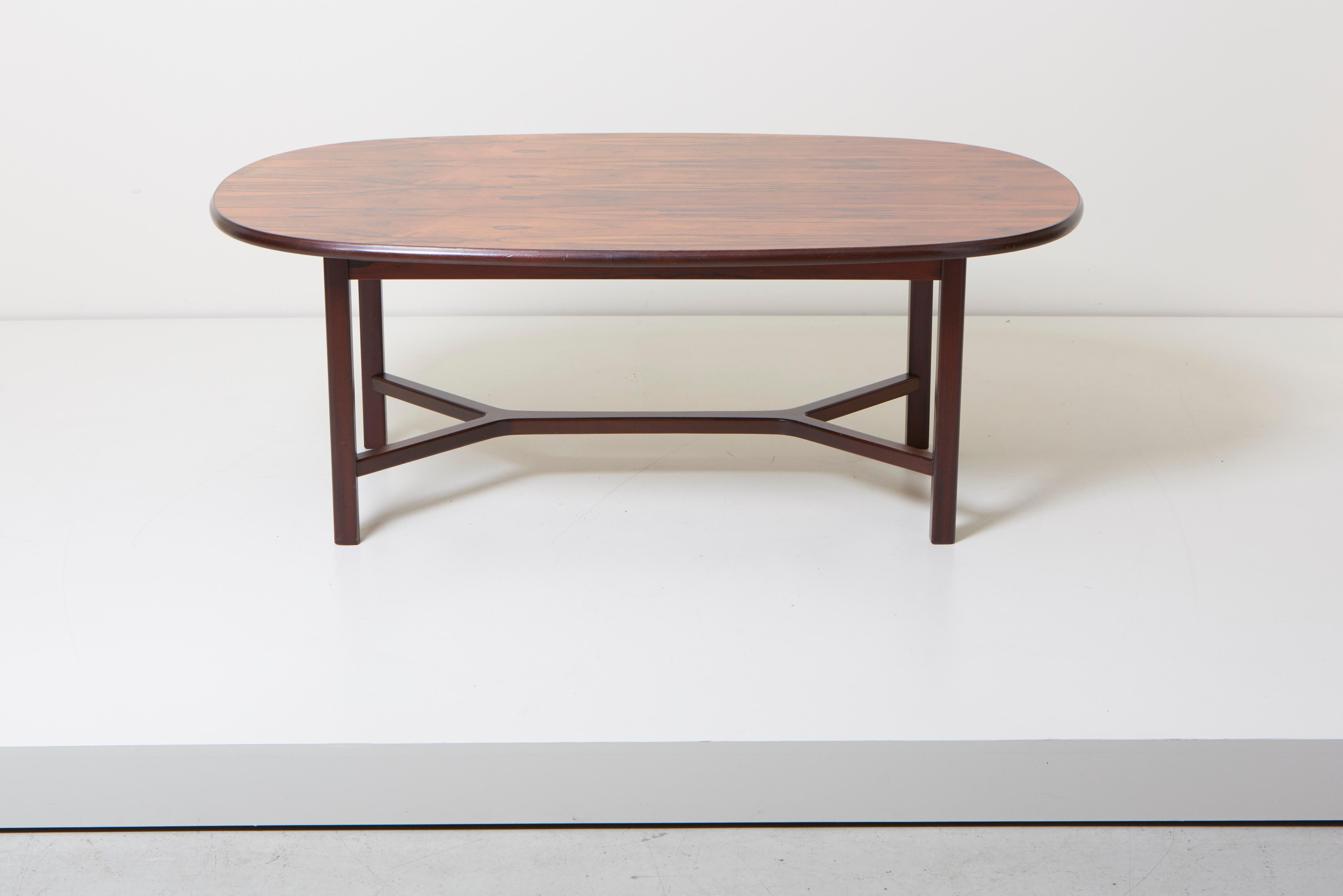 Large oval coffee table in wood designed by Norwegian designer Torbjørn Afdal for Bruksbo.