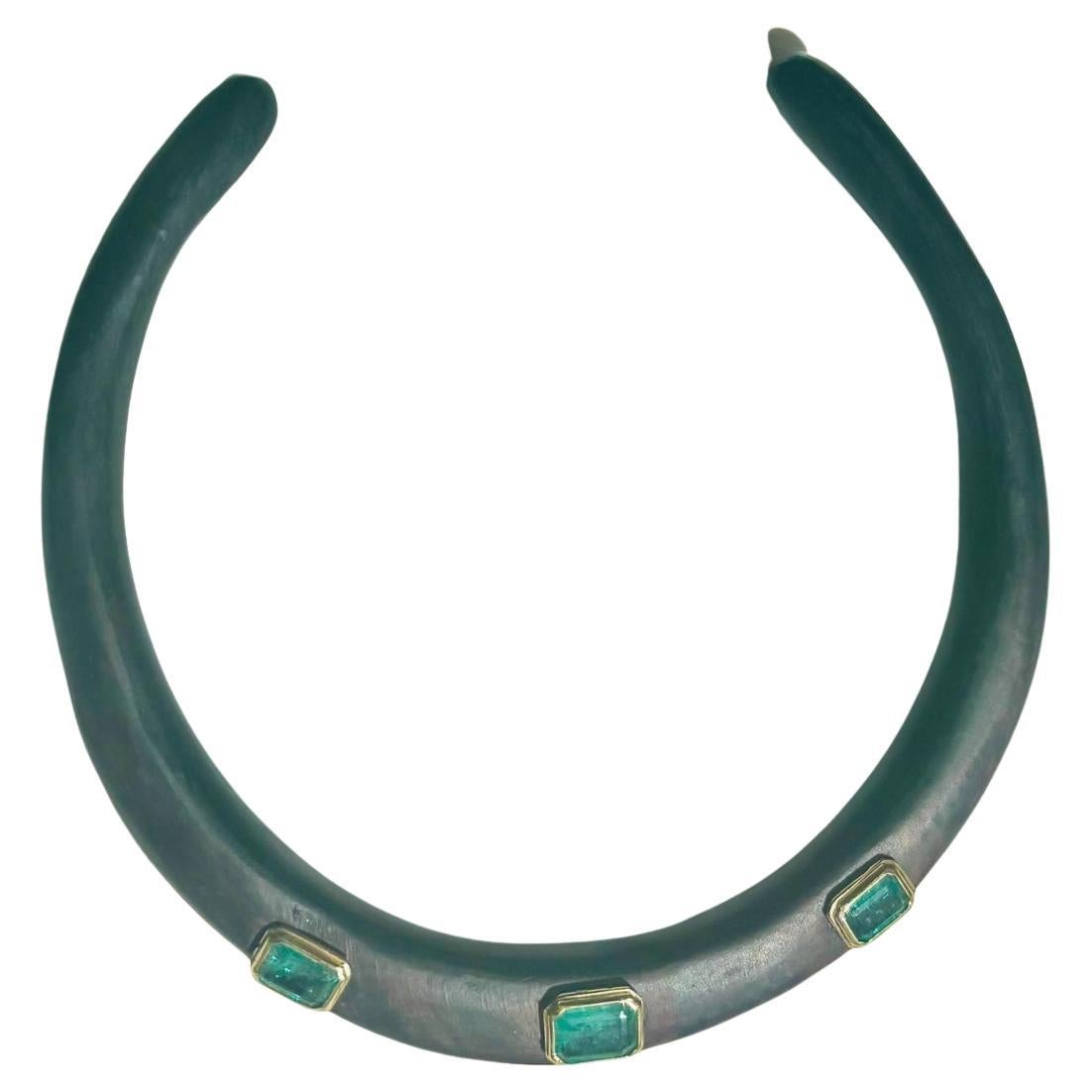 WOOD AND EMERALD COLLAR NECKLACE

Wood, Emeralds, 14k Gold

This is a stunning, one-of-a-kind collar necklace. The wood is hand carved in Bali. The three Zambian Emeralds are bezeled in a thick 14k gold setting.

The emerald sizes: 10x8mm, 9x8mm,