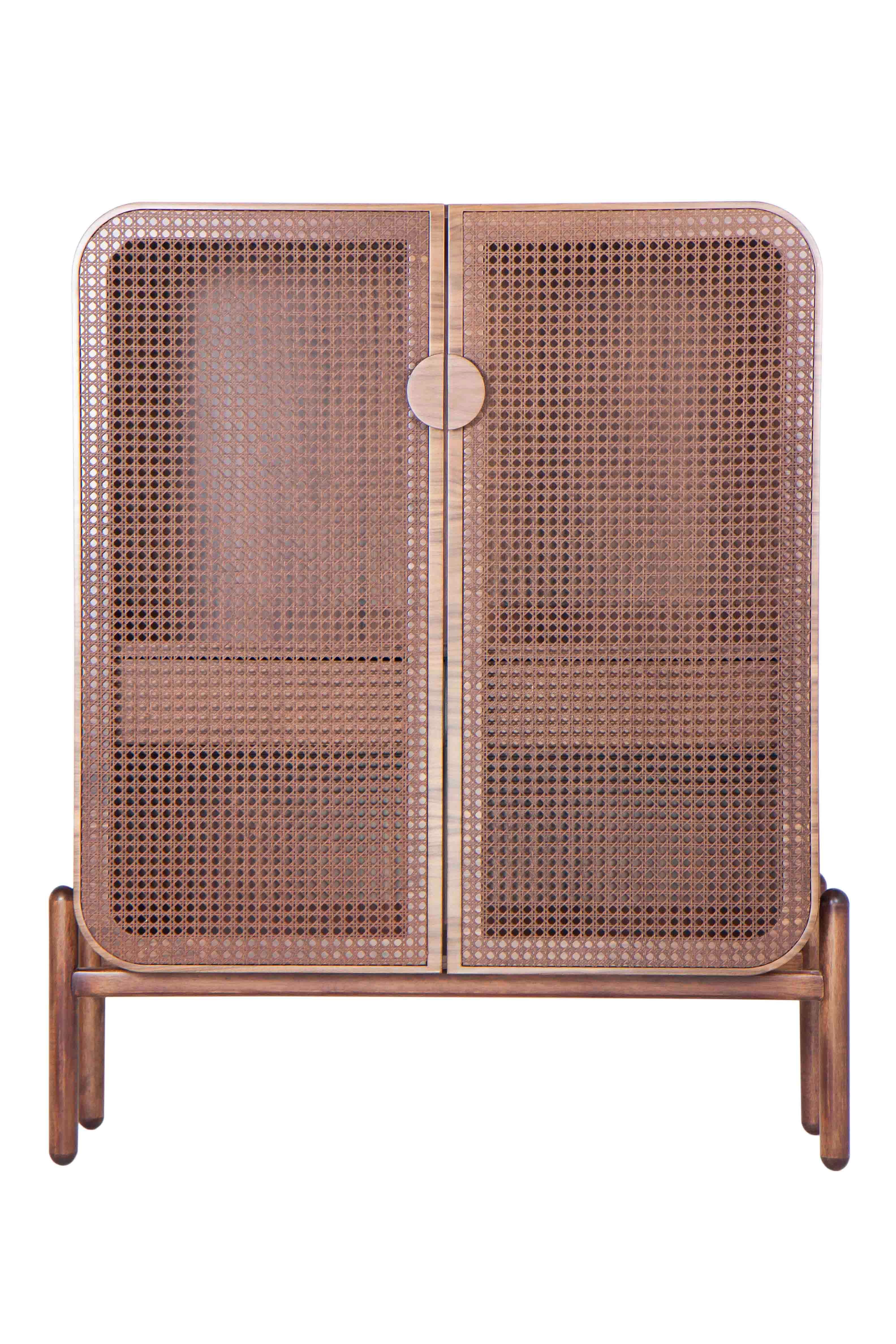 An amazing piece with a lot of space with two (2) convenient drawers inside.
Made with special attention to detail, the caned doors leave subtle transparency, bringing lightness to the piece.
Solid wood and straws/wicker (caning)
Color: