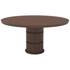 Wood dining table with solid top and cylindrical base with special cut details
