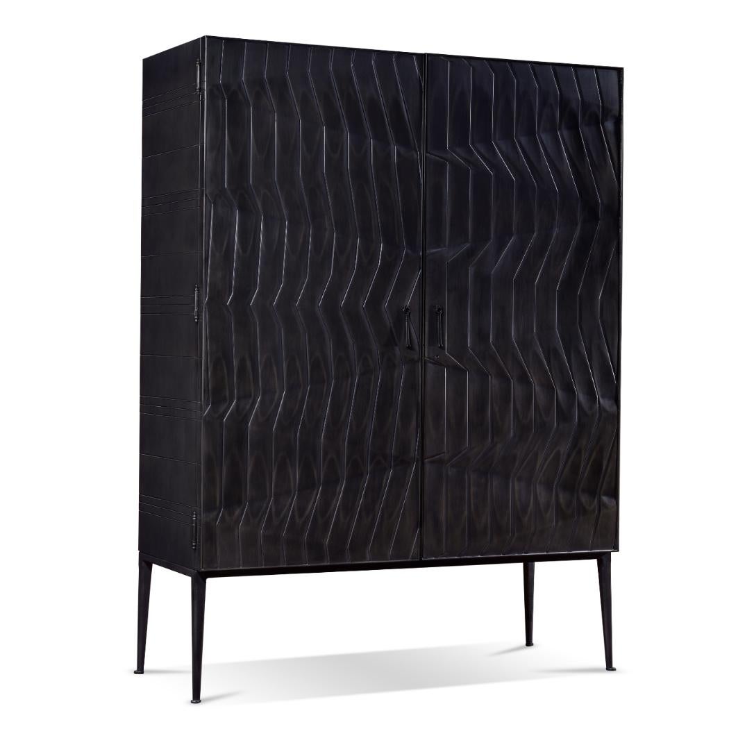 Mexican Wood Drezzo armoire w/ asymmetrical textured design & polished metal-look finish For Sale
