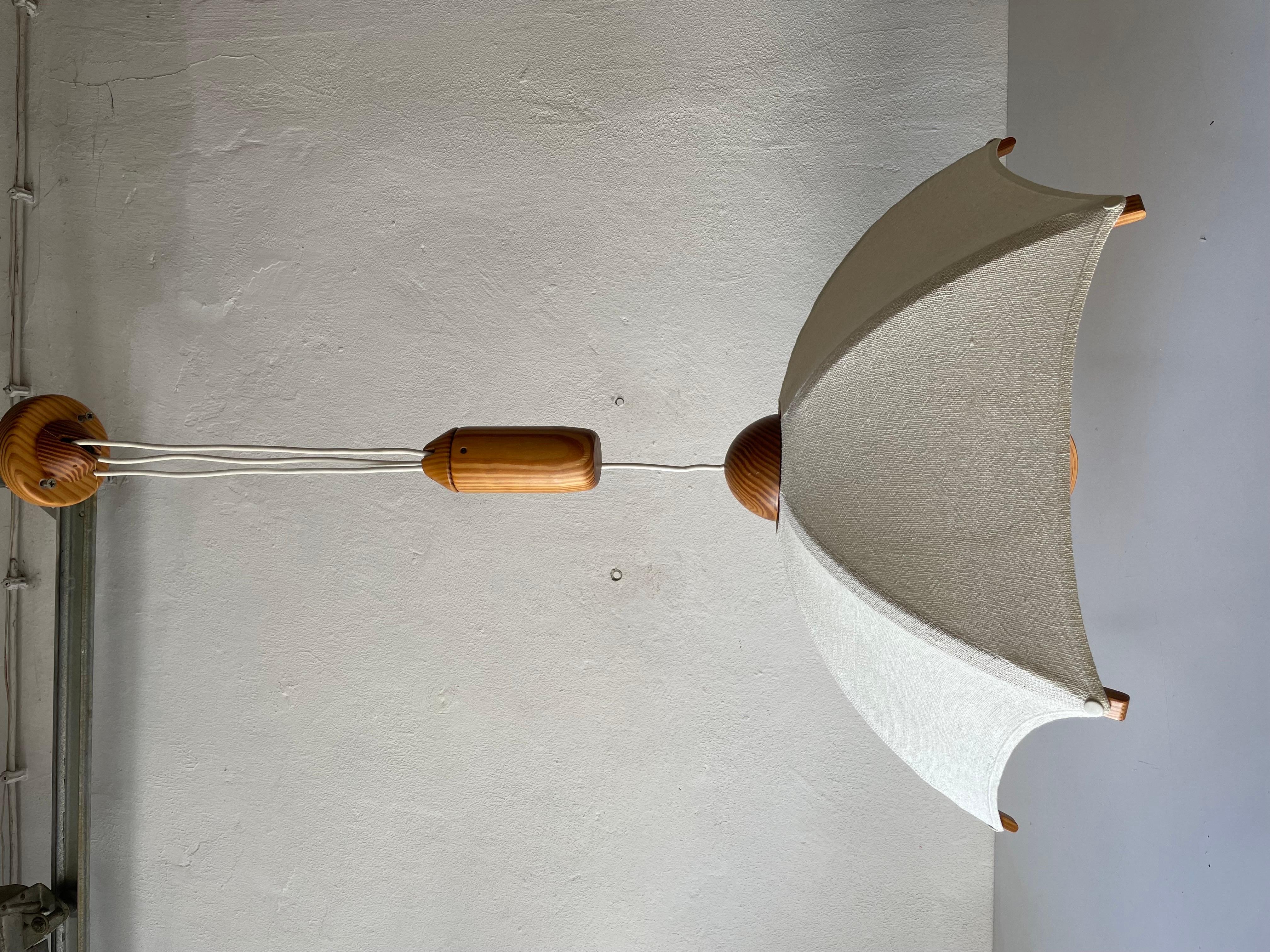 Wood & fabric shade counterweight pendant lamp by Domus, 1980s Italy

Minimalist and rare design. 

Lampshade is in good condition and clean. 
This lamp works with E27 light bulb. 
Max 100W Wired and suitable to use with 220V and 110V for all