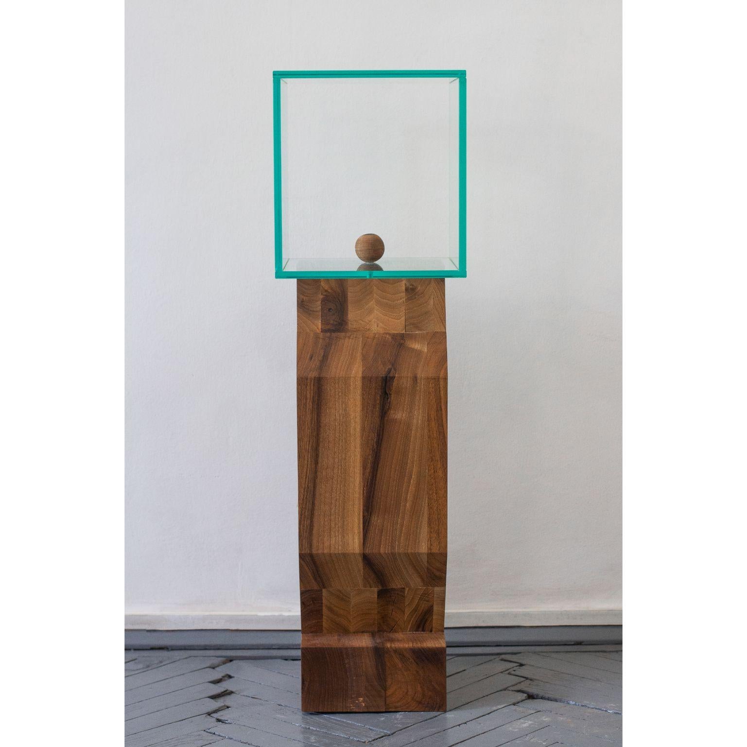 Wood figure with glass head by Radu Abraham
Limited Edition of 10
Materials: Walnut wood, glass
Dimensions: 25 x 25 x 87 cm

A massive block of walnut wood, glued together in shape then cut directly in block for getting the wanted shape. On top,
