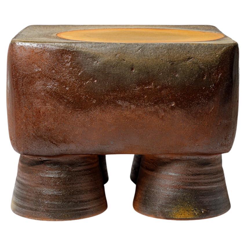 Wood fired ceramic coffee table or stool  by Mia Jensen, 2025.