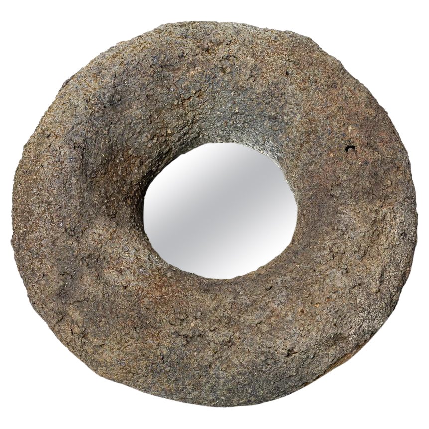 Wood fired ceramic mirror by Mia Jensen, 2023.