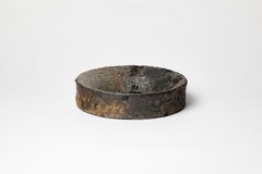 Wood fired ceramic mirror by Mia Jensen, 2025.