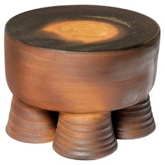 Wood fired ceramic stool or coffee table by Mia Jensen, 2024.