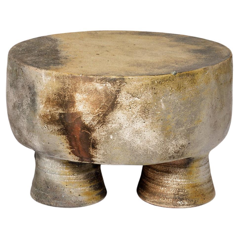 Wood fired ceramic stool or coffee table by Mia Jensen, 2024.