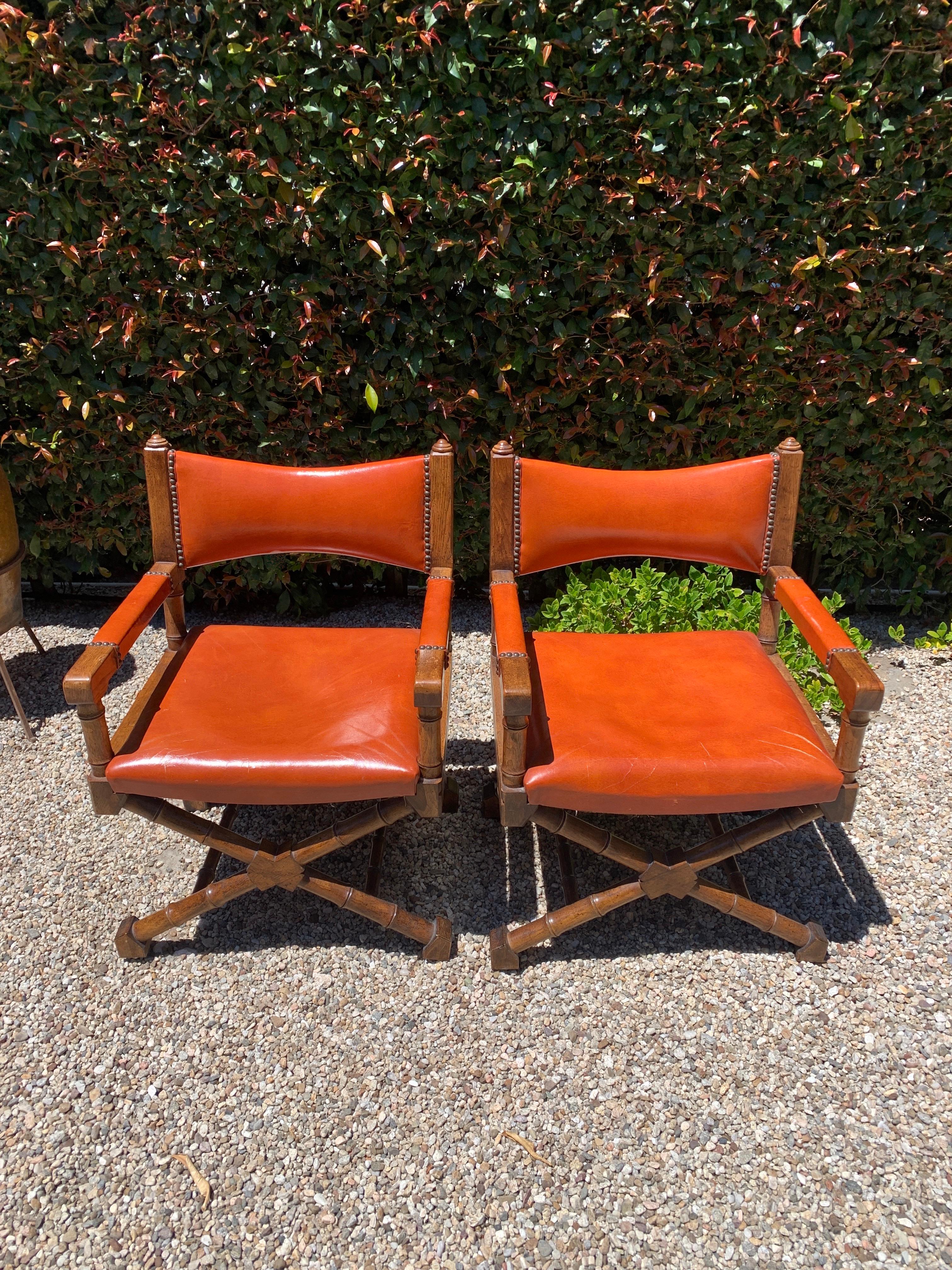 A wonderful example of a campaign chair from the 70's or 80's with wooden frame and orange leather. Shown are two, however we are selling one for this posting. 

A compliment to many spaces.