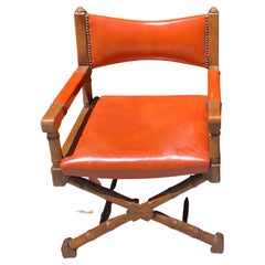 Wood Frame Campaign Chair with Orange Leather Upholstery