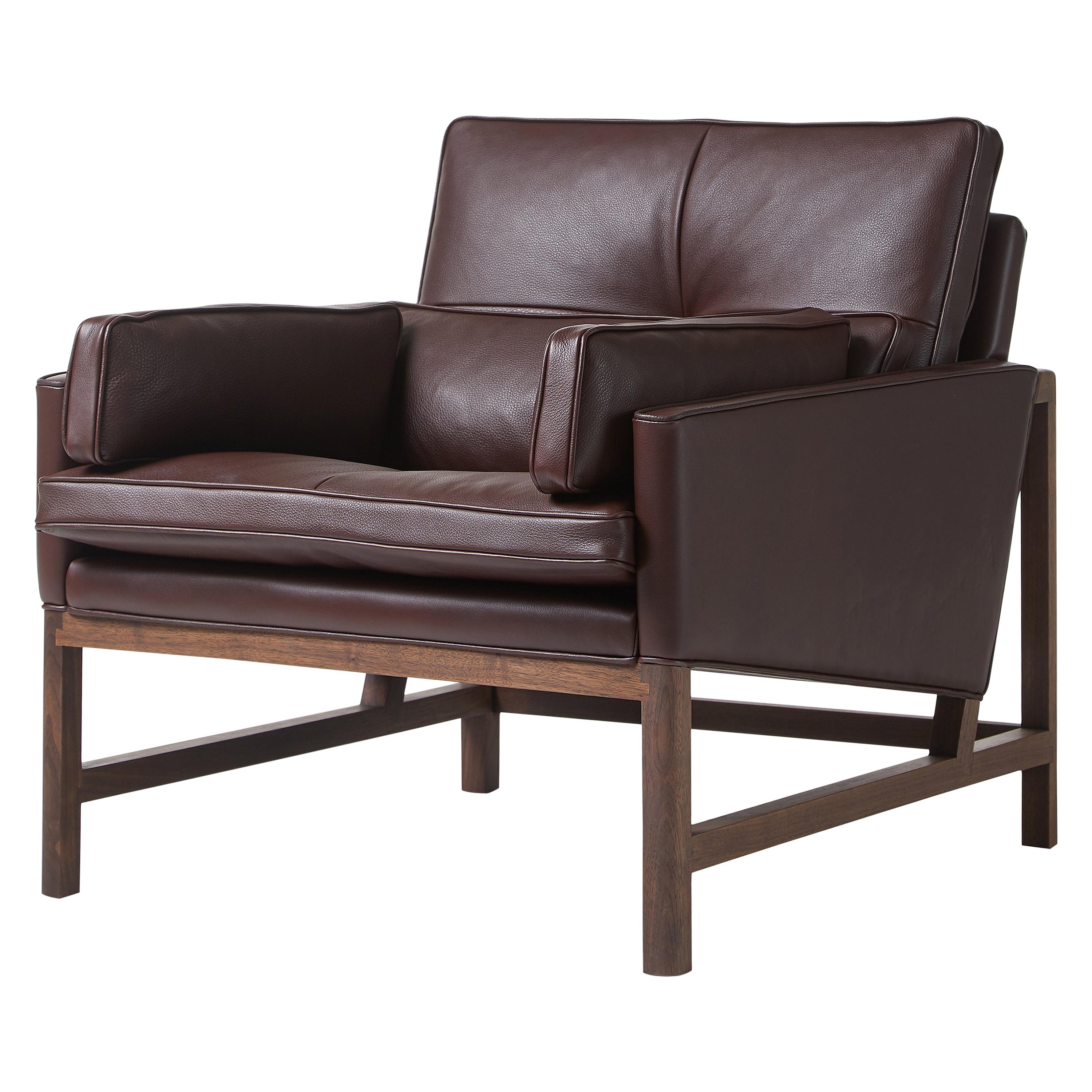 Wood Frame Low Back Lounge Chair in Walnut Black Oil Designed by Craig Bassam