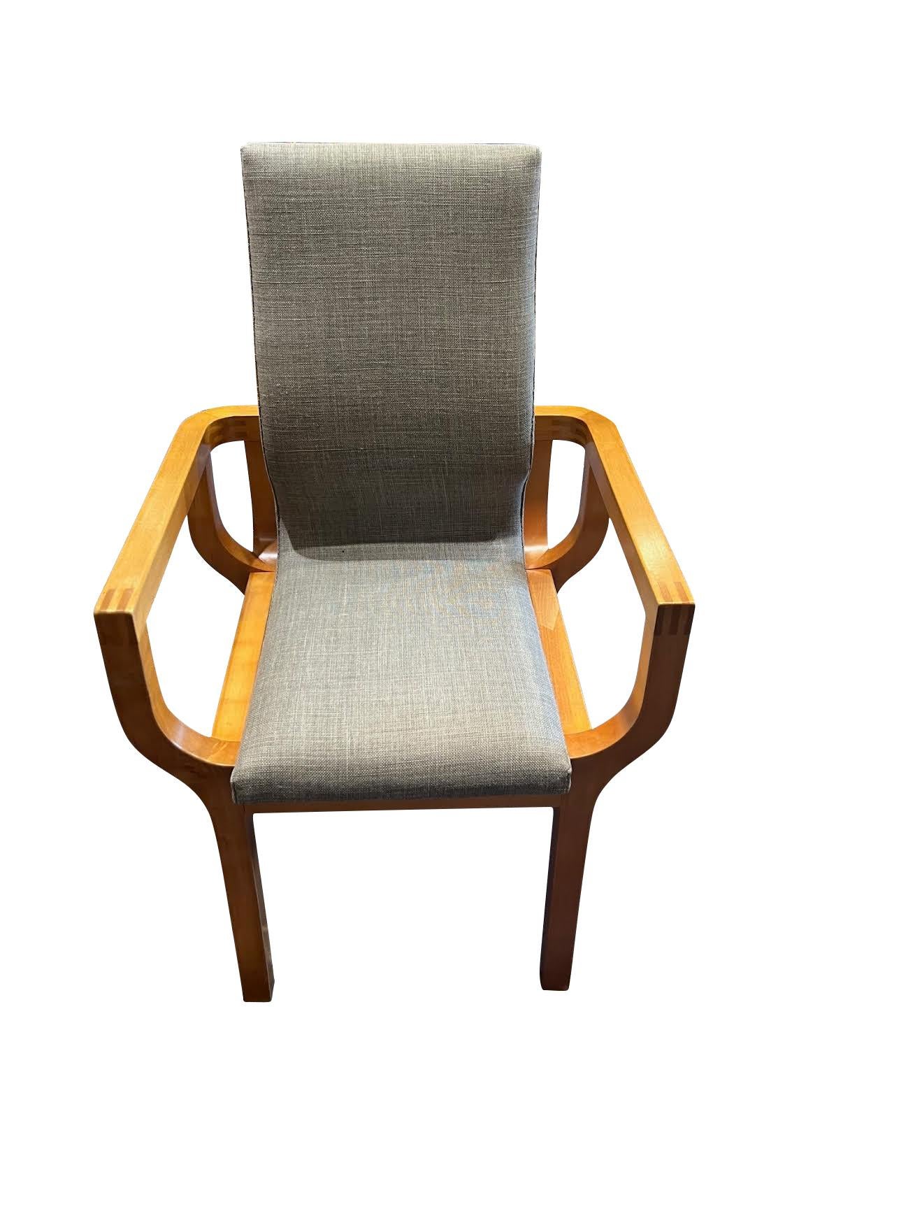 1970's English pair John Makepeace wood framed pull up chairs.
Exposed dovetail joints.
Out swept arms.
Newly reupholstered in Belgian linen.
Newly refinished.
Stamped 
