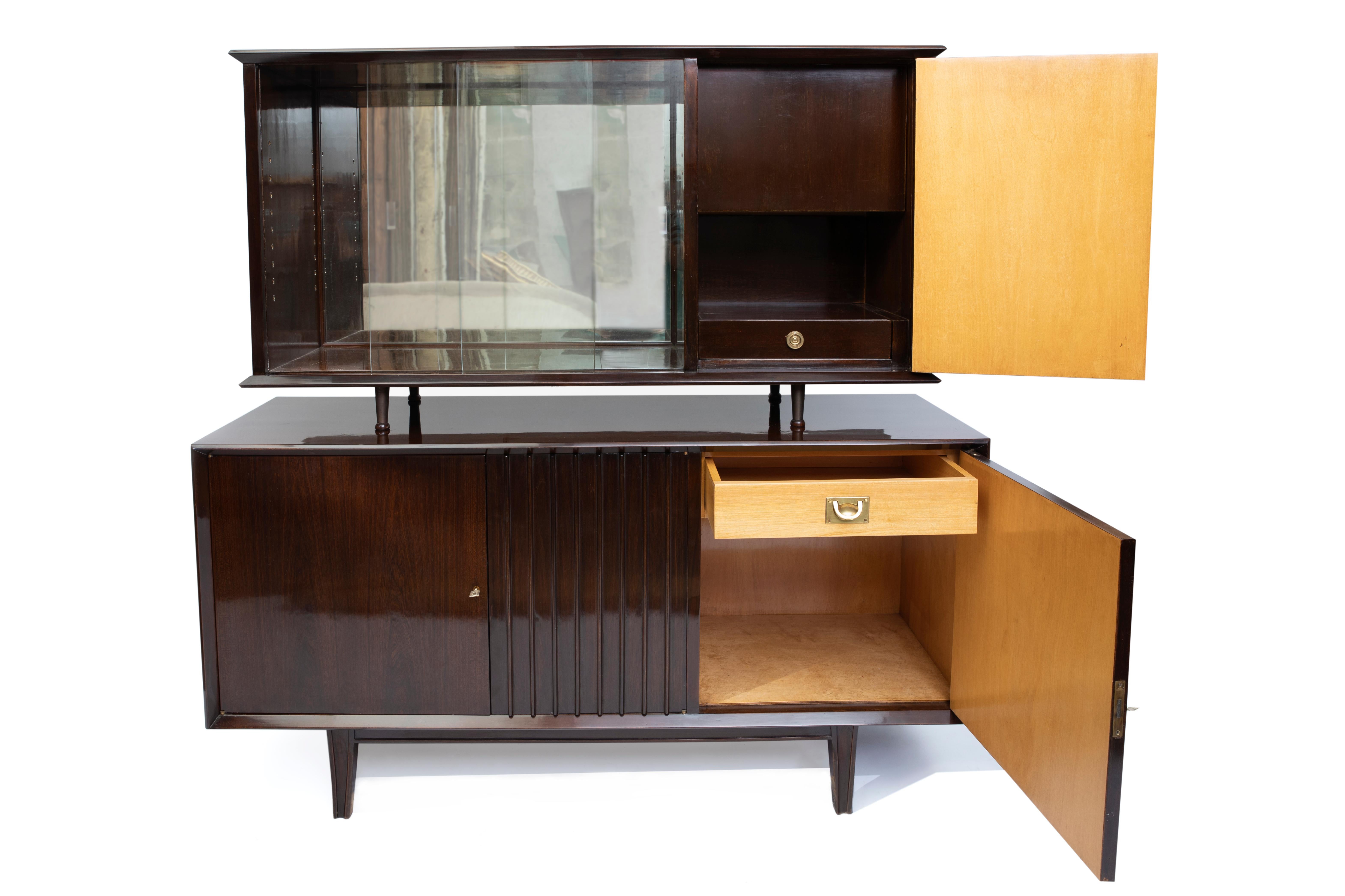 Wood, glass, mirror and bronze cabinet and vitrine by Englander & Bonta, Argentina, circa 1950.
It comes with glass shelves for the vitrine side.
  