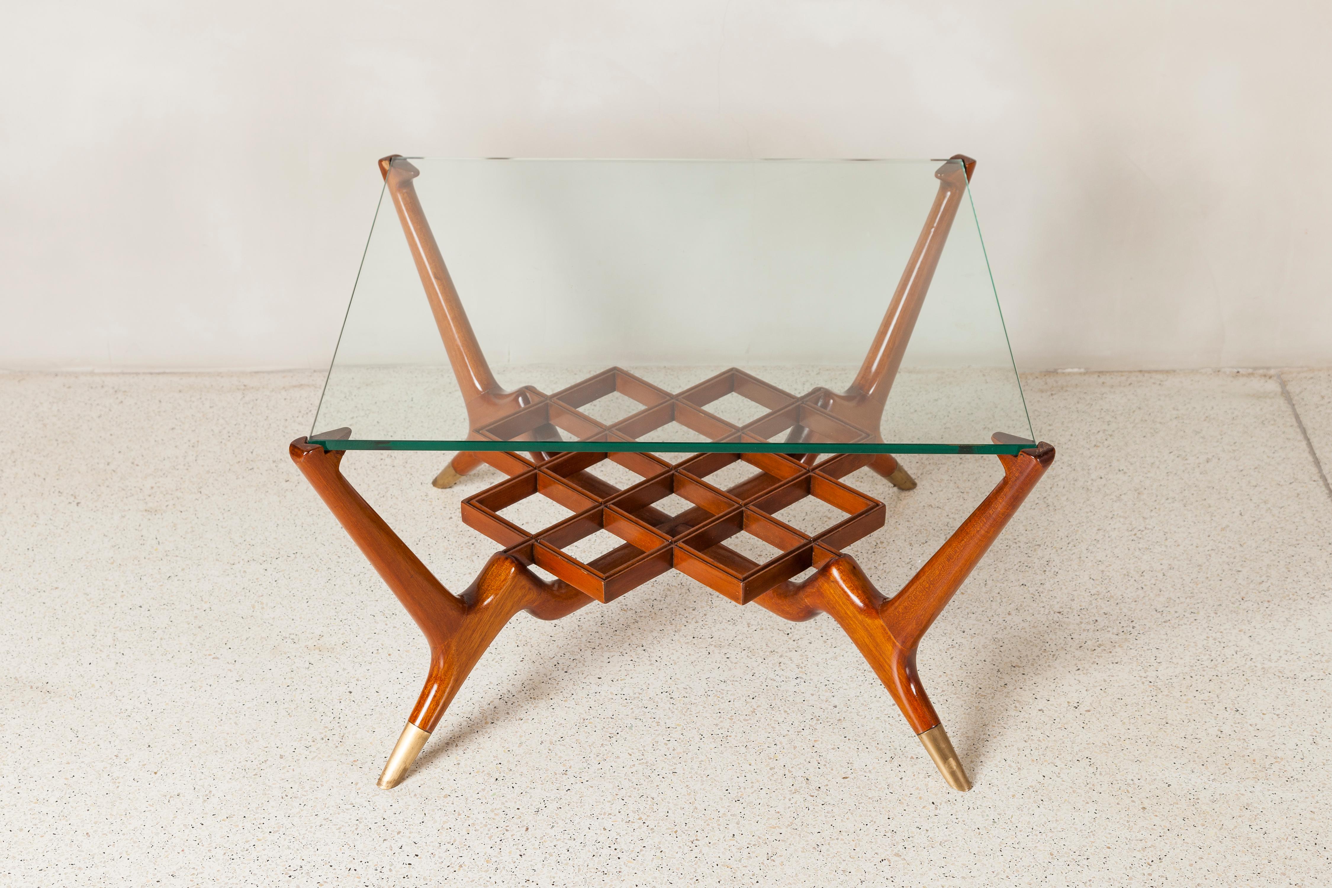 Wood, glass and bronze low table by Englander & Bonta, Argentina, circa 1950.
Glass dimensions: 1 cm height, 60 cm width, 60 cm depth.