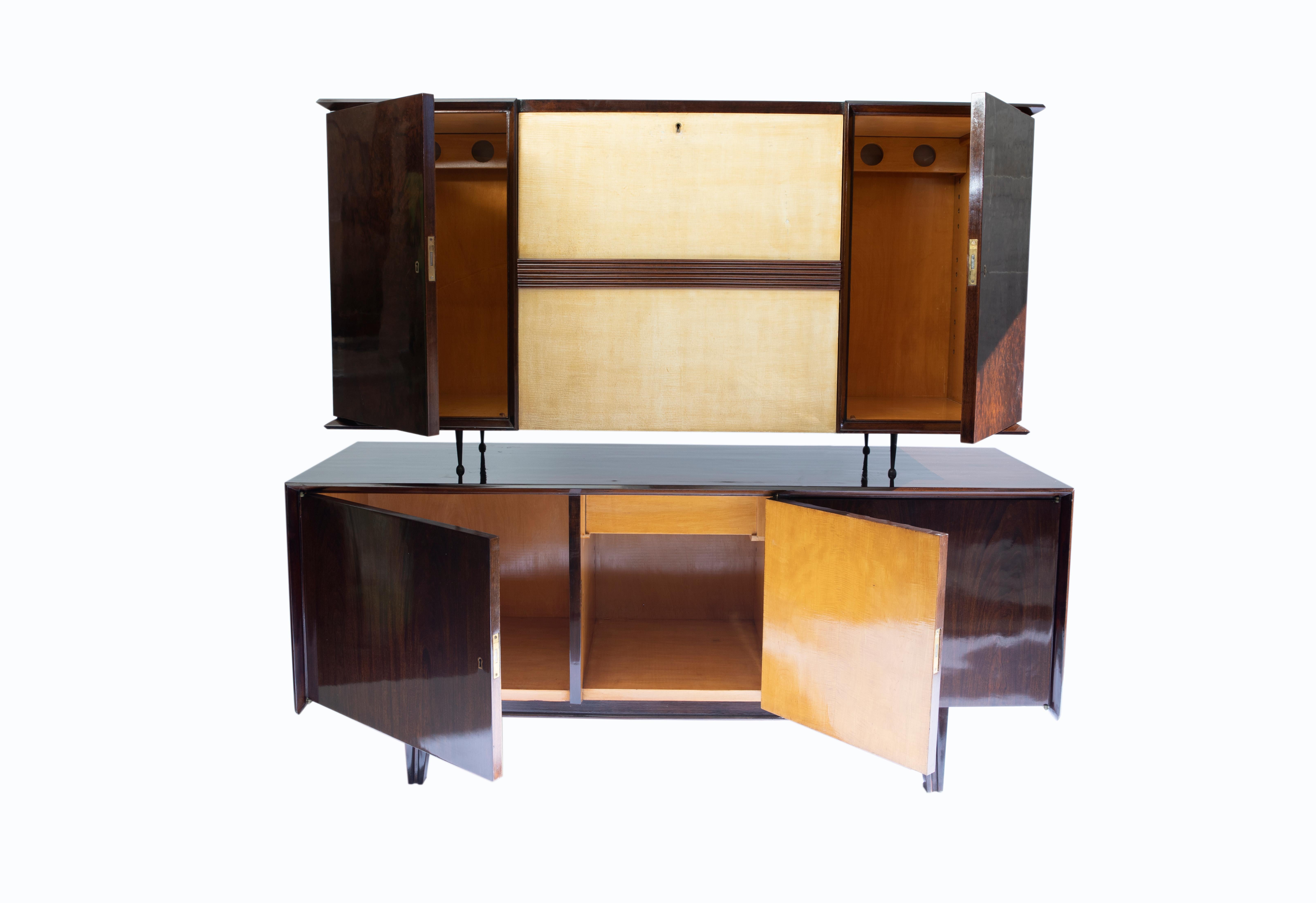 Wood, glass, parchment and mirror bar and cabinet set by Englander & Bonta. Argentina, circa 1950.
It comes with glass shelves.
 