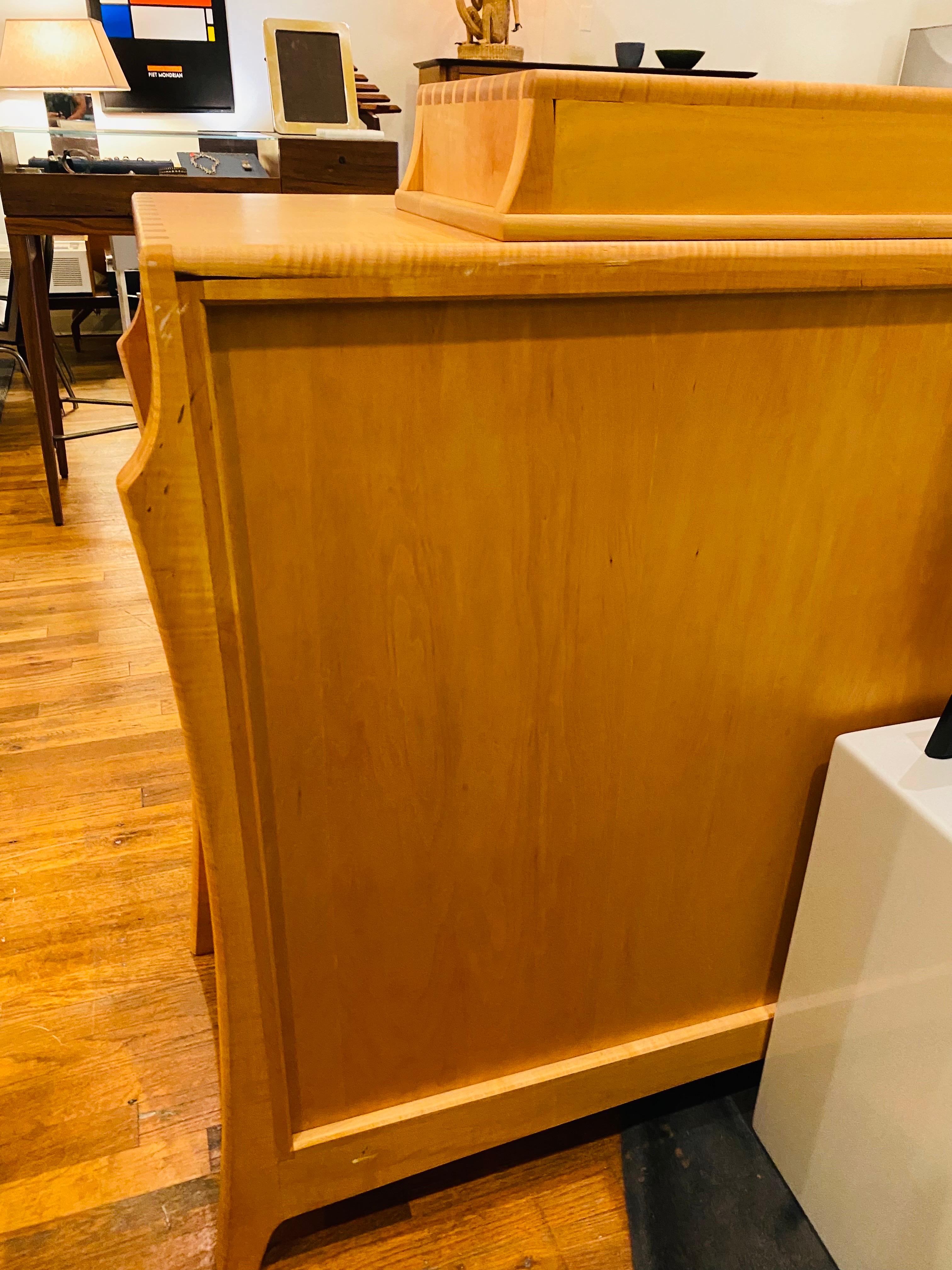 Beautiful contemporary handcrafted furniture. Created by Anthony Kahn, this piece of furniture embodies an absolute commitment to fine craftsmanship and artisanry. This handcrafted piece is unique and interprets beauty and detail that is unique to