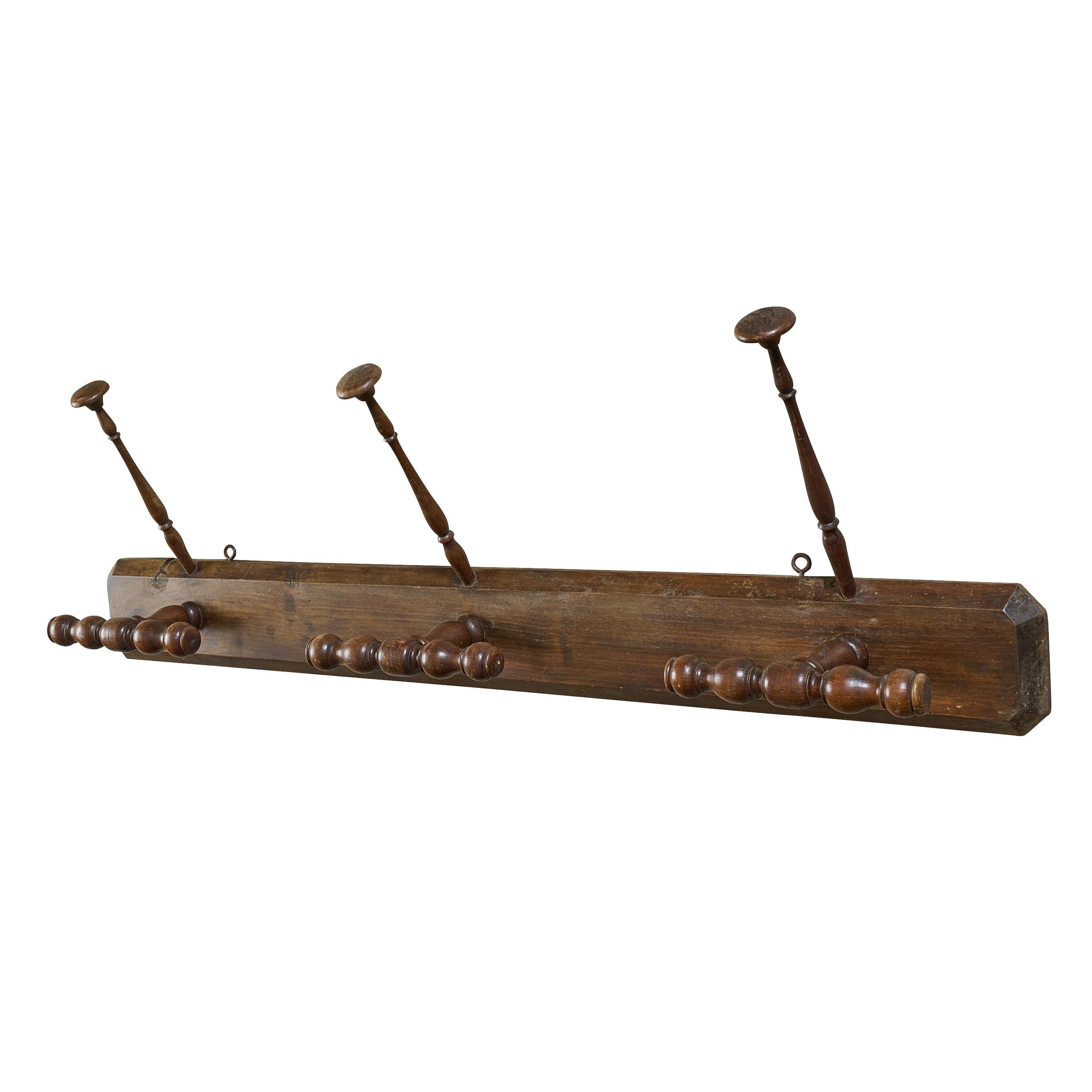 Wood six hook hat and coat rack. With great design and function.

