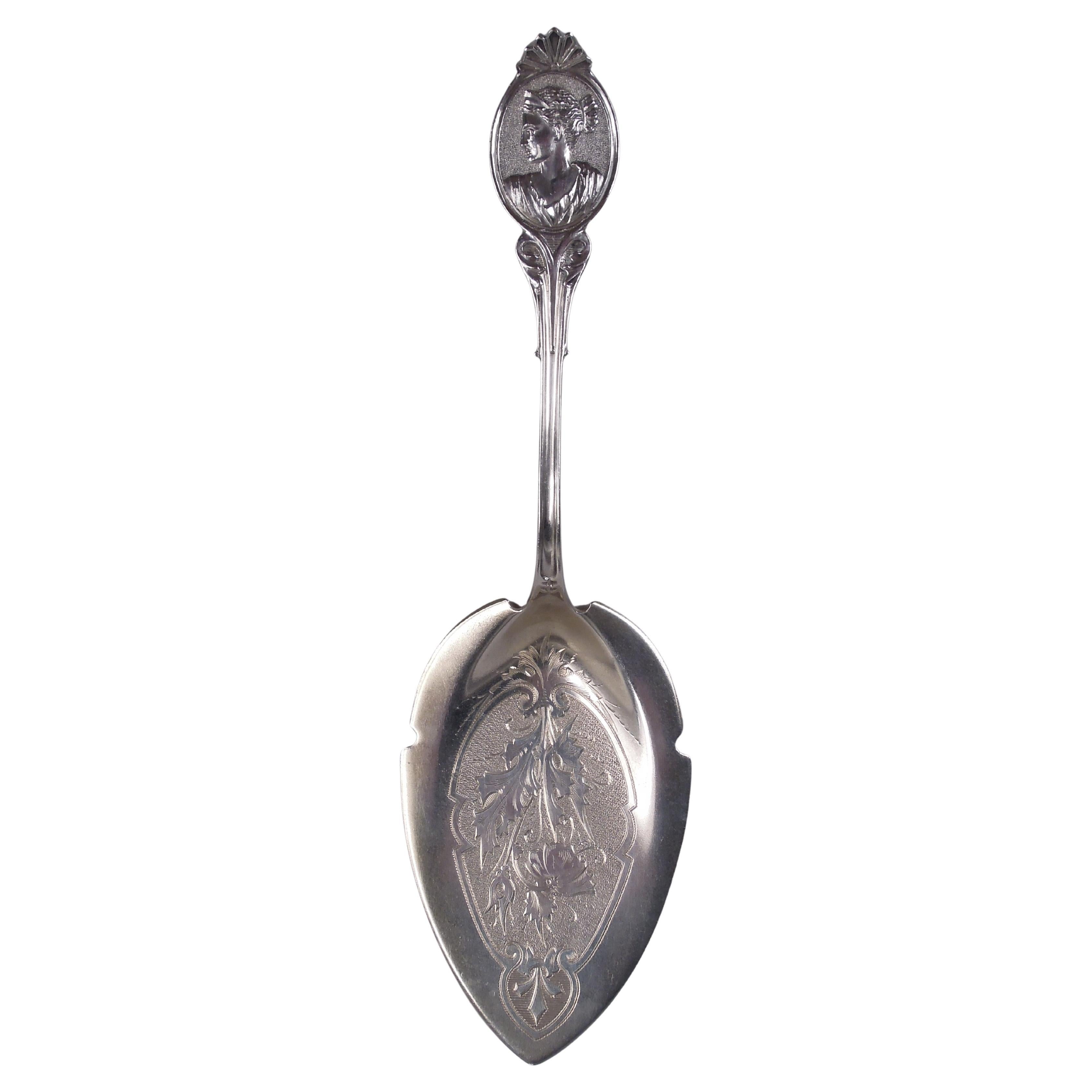 Wood
Hughes Couvert à tarte en argent avec médaillon et pièce de Diana