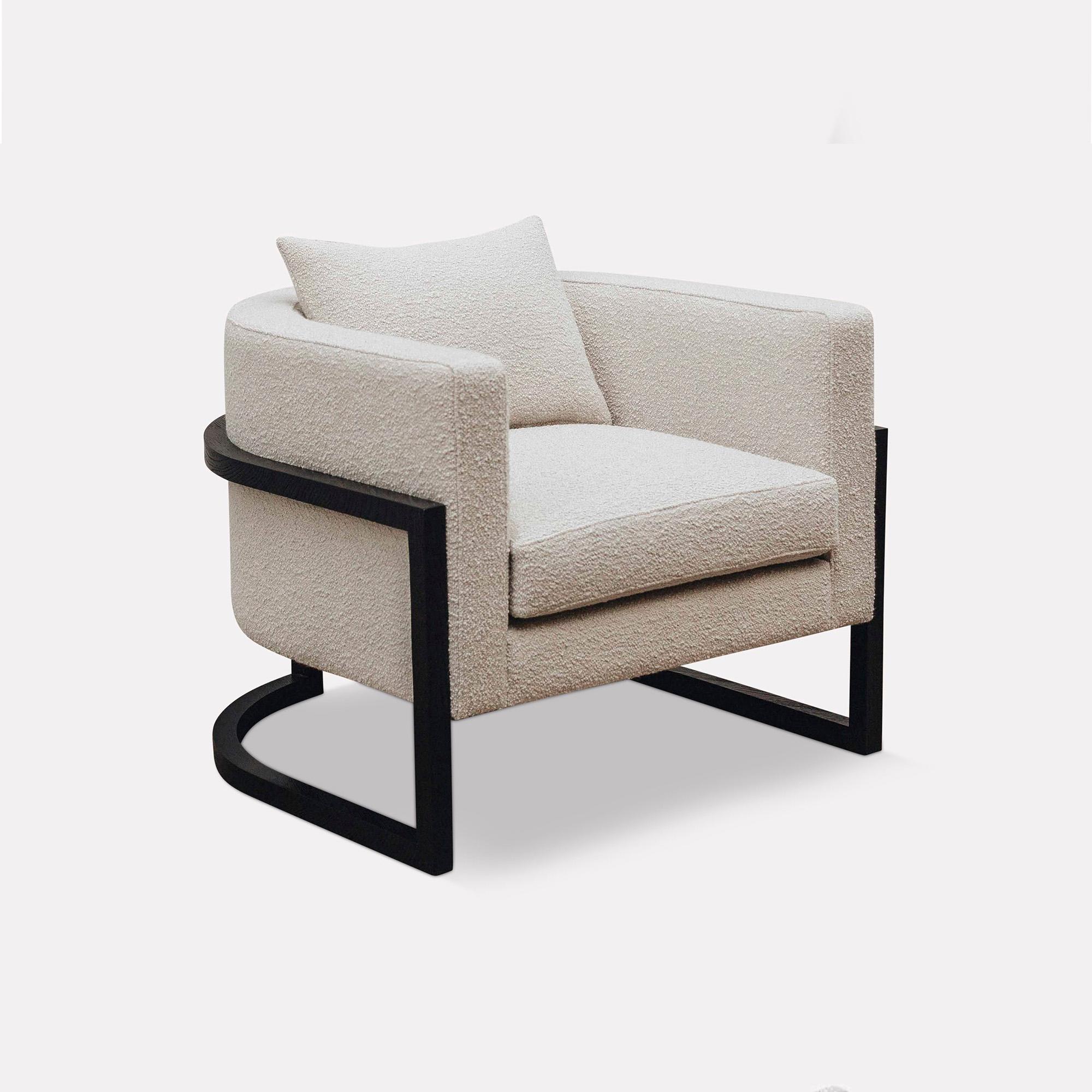 Wood Julius Armchair by Duistt
Dimensions: W 86 x D 84 x H 70 cm
Materials: Duistt Fabric, Darkened Oak
Notes: One back cushion included

The JULIUS wood armchair, crafted with great attention to detail, features clean and modern lines always with a