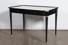 Wood, leather and bronce desk attributed to Maison Jansen, France, circa 1950.