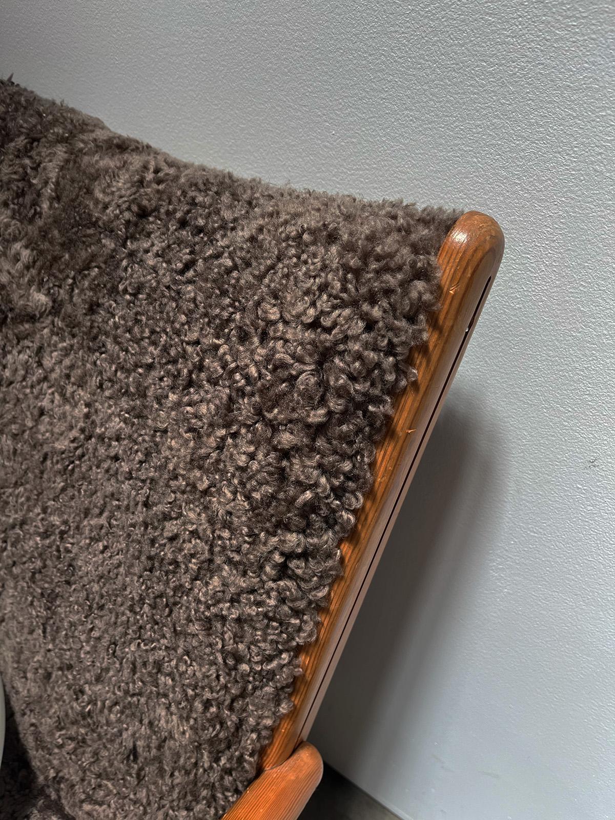 Unknown Wood Love Seat with Mocha Sheepskin For Sale
