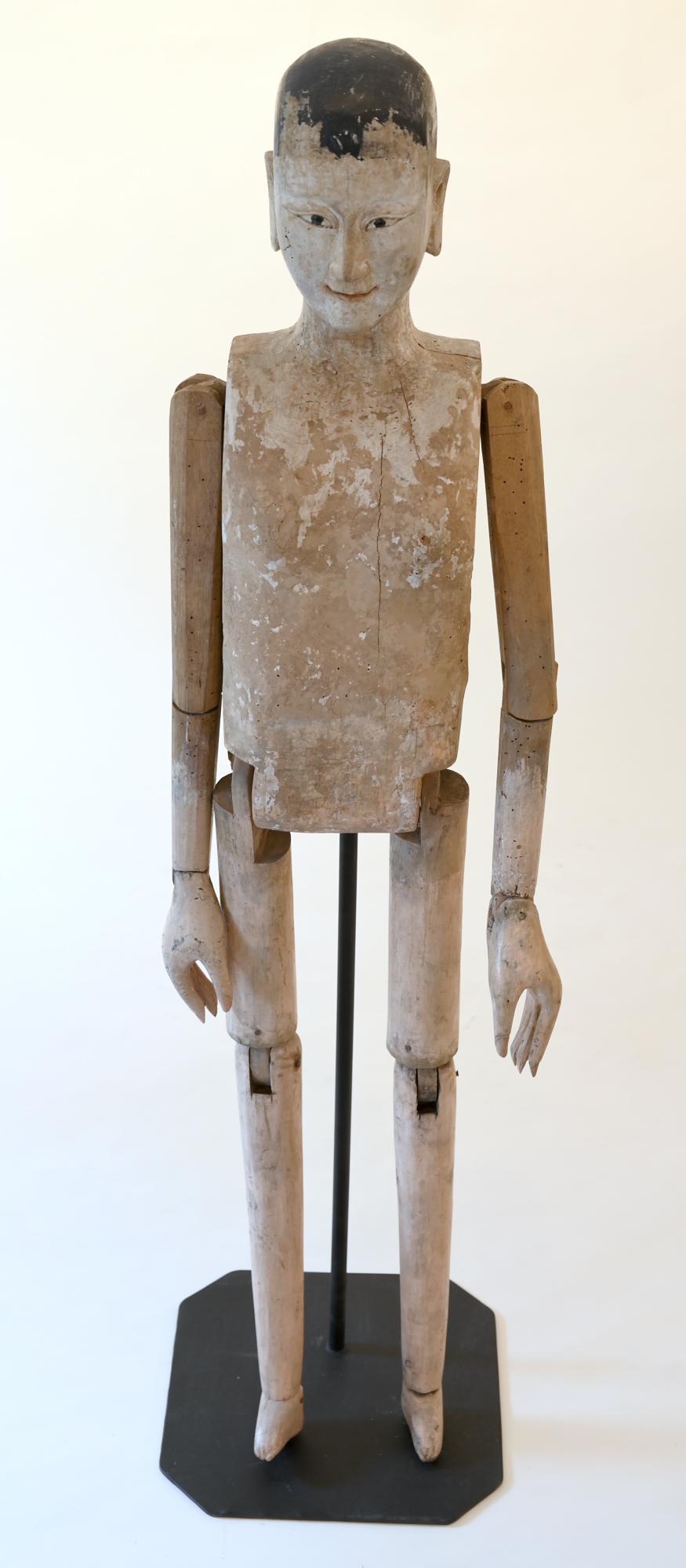 Wood mannequin from Kanton, China circa 1900 original painting

Wood mannequin partly original painting circa 1900
Arms and legs are moveable 
Special elaboration of the head an the hands.