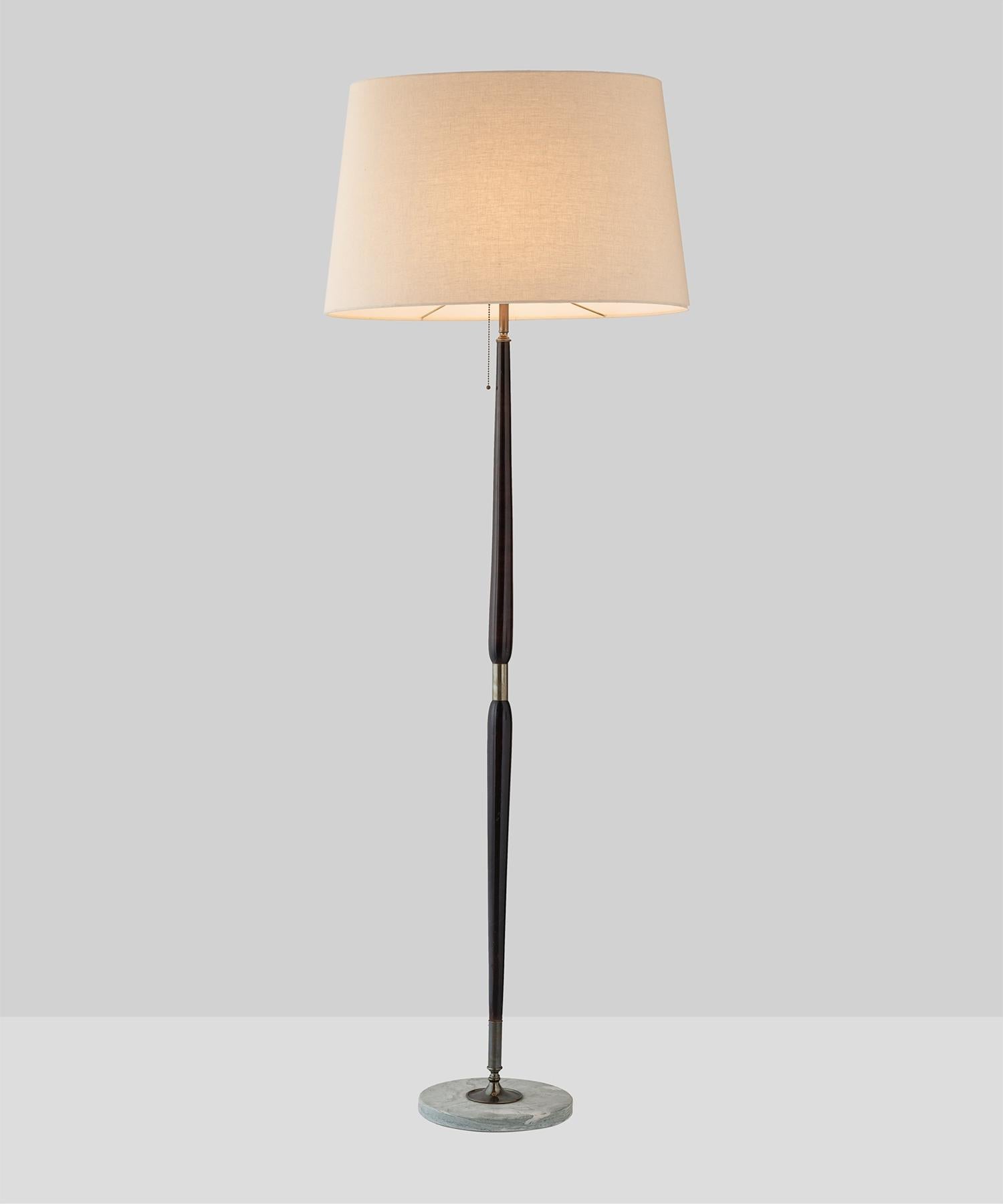 Wood & marble floor lamp, Italy, circa 1950.

Tapered wooden rod with brass detailing and marble base. New oblong linen shade.
