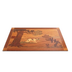 Wood marquetry panel of a landscape with hunting dog, c. 1935