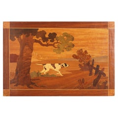 Wood marquetry panel of a landscape with hunting dog, c. 1935