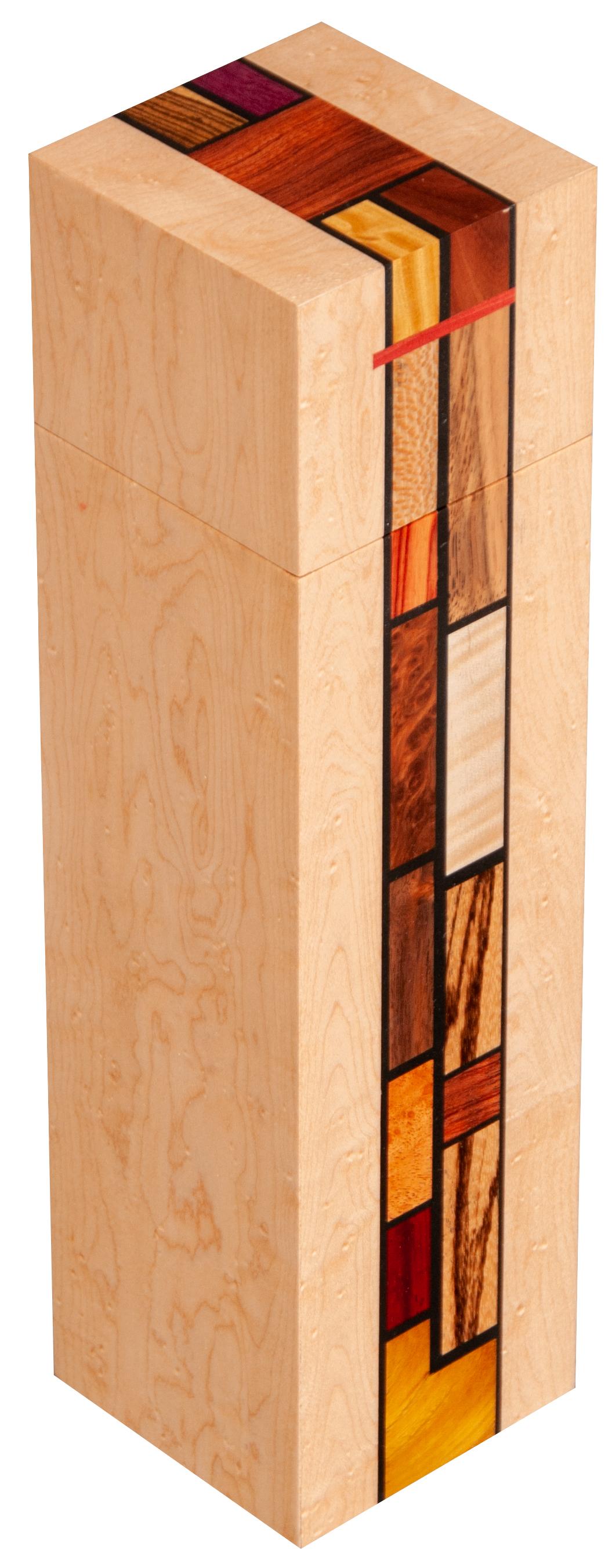 This art box were designed and constructed to be both decorative as well as useful as urns for cremation ashes. They are decorated with our mosaic work that embodies the De Stijl art movement of 1918 in particularity the rectilinear work of Piet